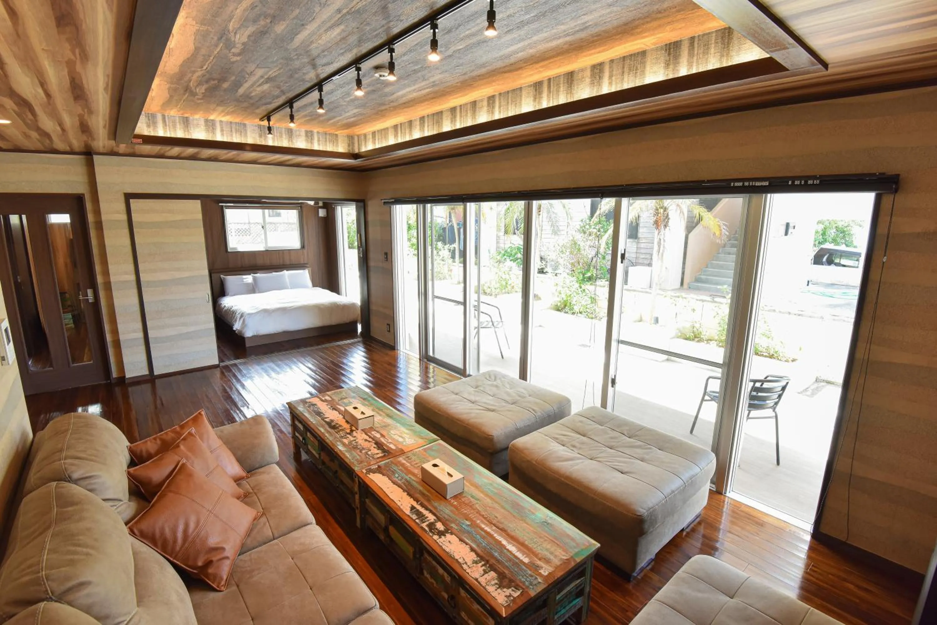 Living room, Bed in Seven Residence Music