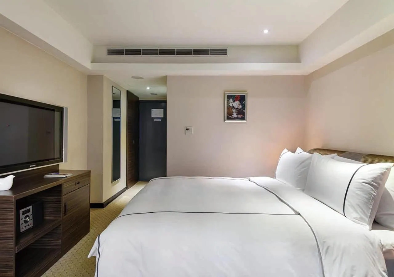 Bed in K Hotel Taipei