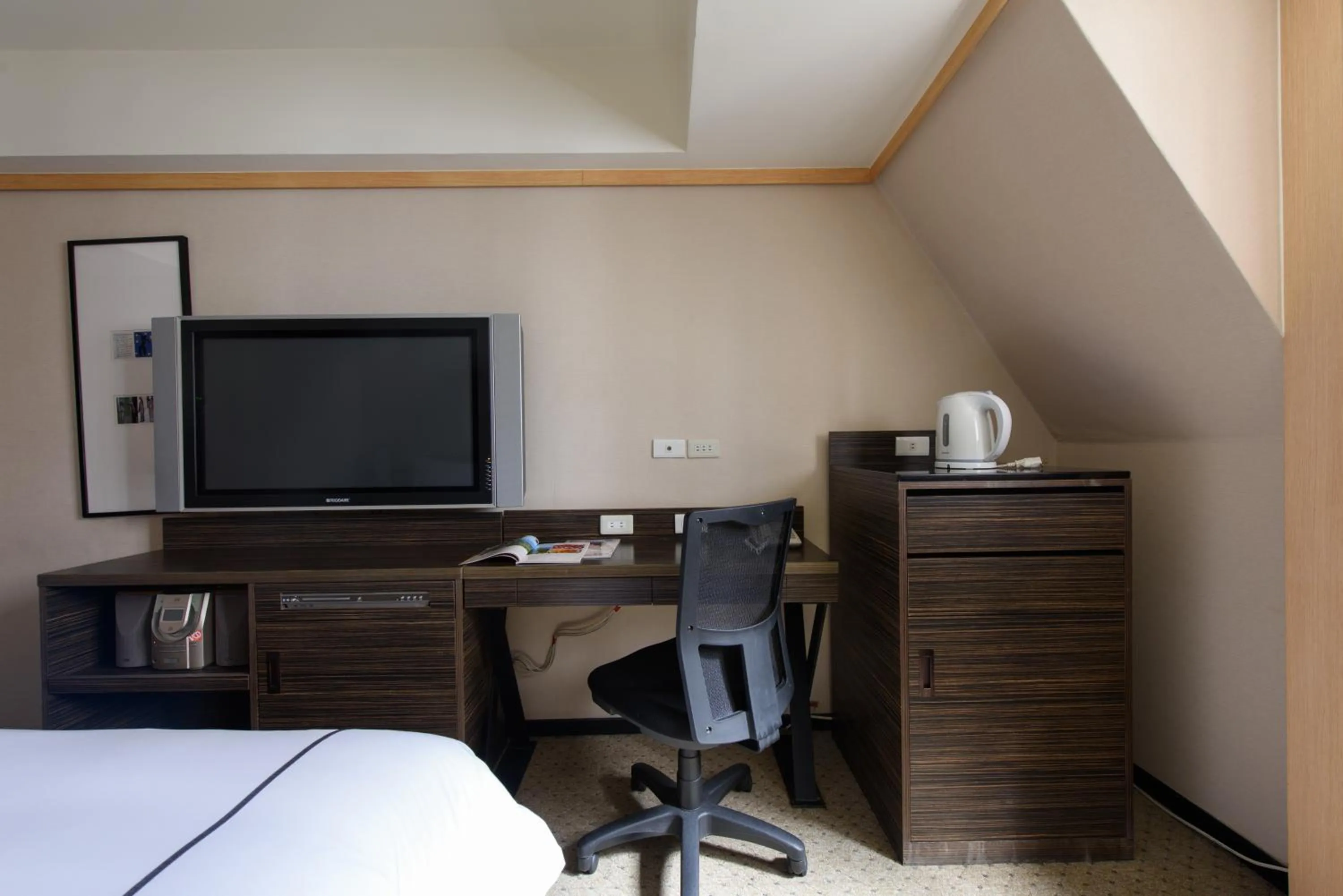 Bed in K Hotel Taipei