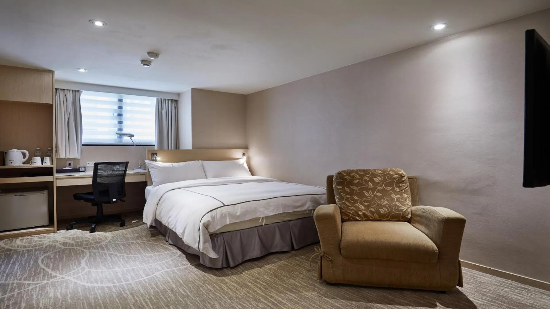 Bed in K Hotel Taipei