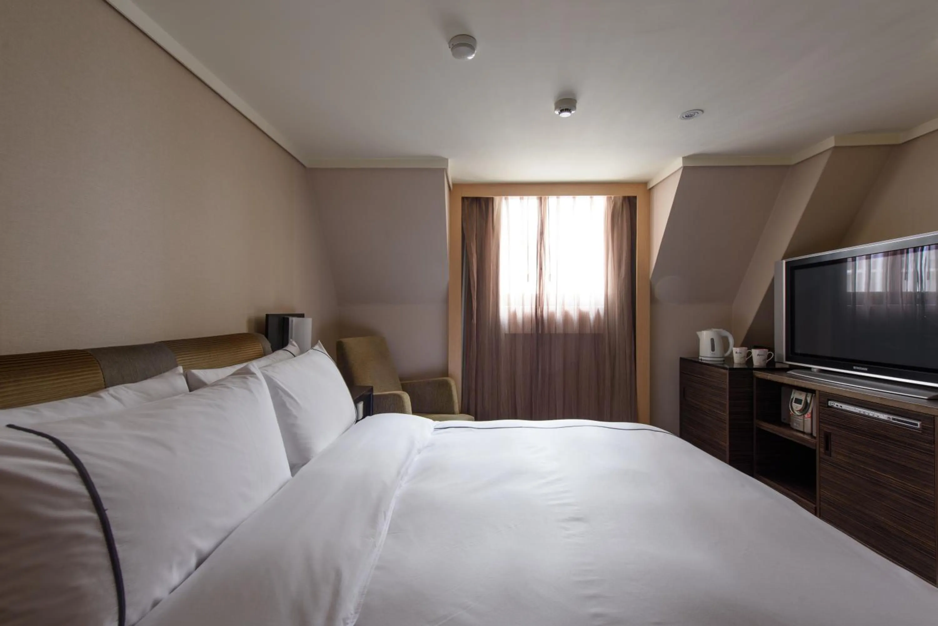 Bed in K Hotel Taipei