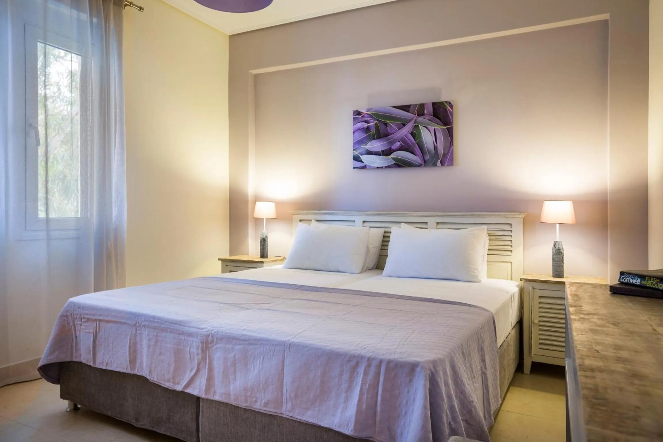 Bed in Meliti Waterfront Suites
