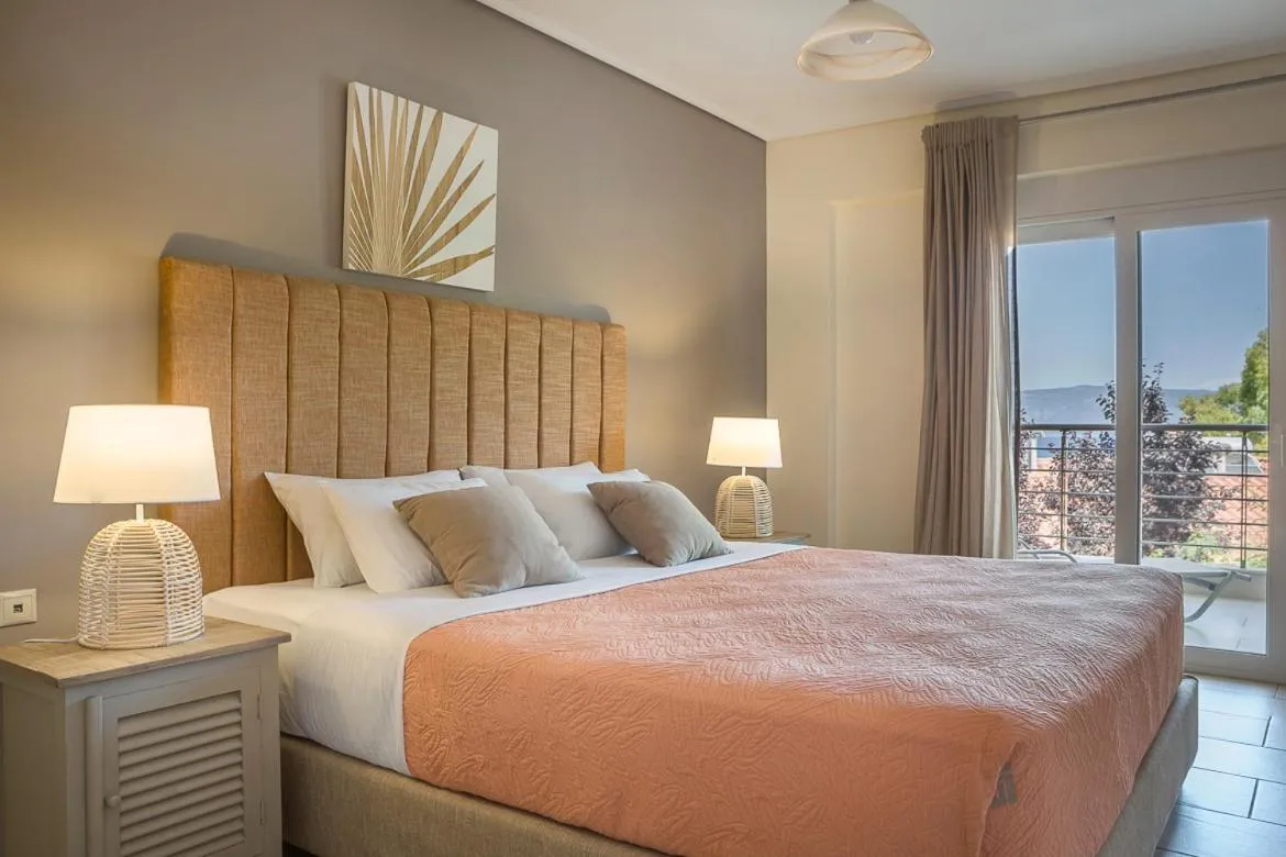 Bed in Meliti Waterfront Suites