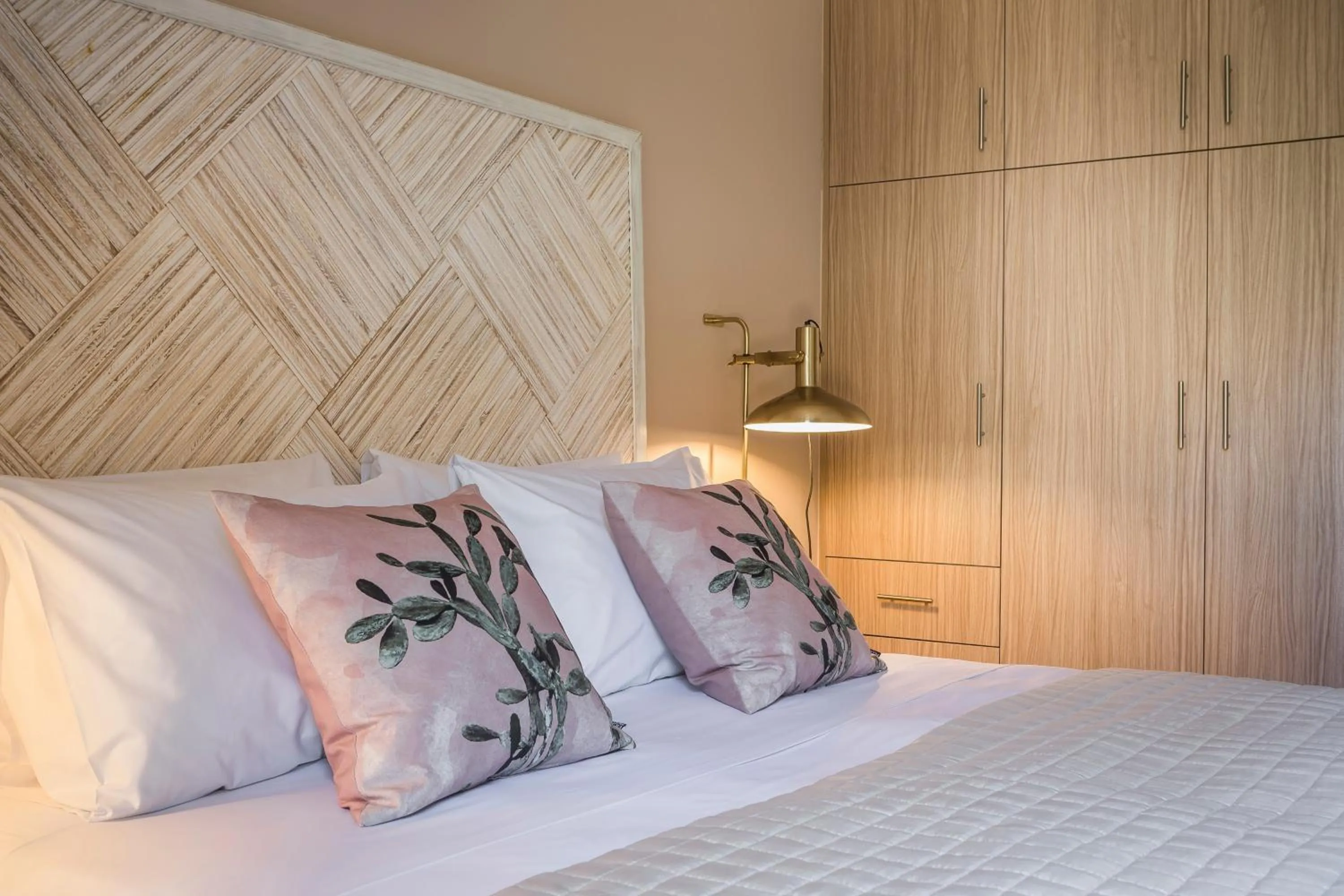 Bed in Meliti Waterfront Suites