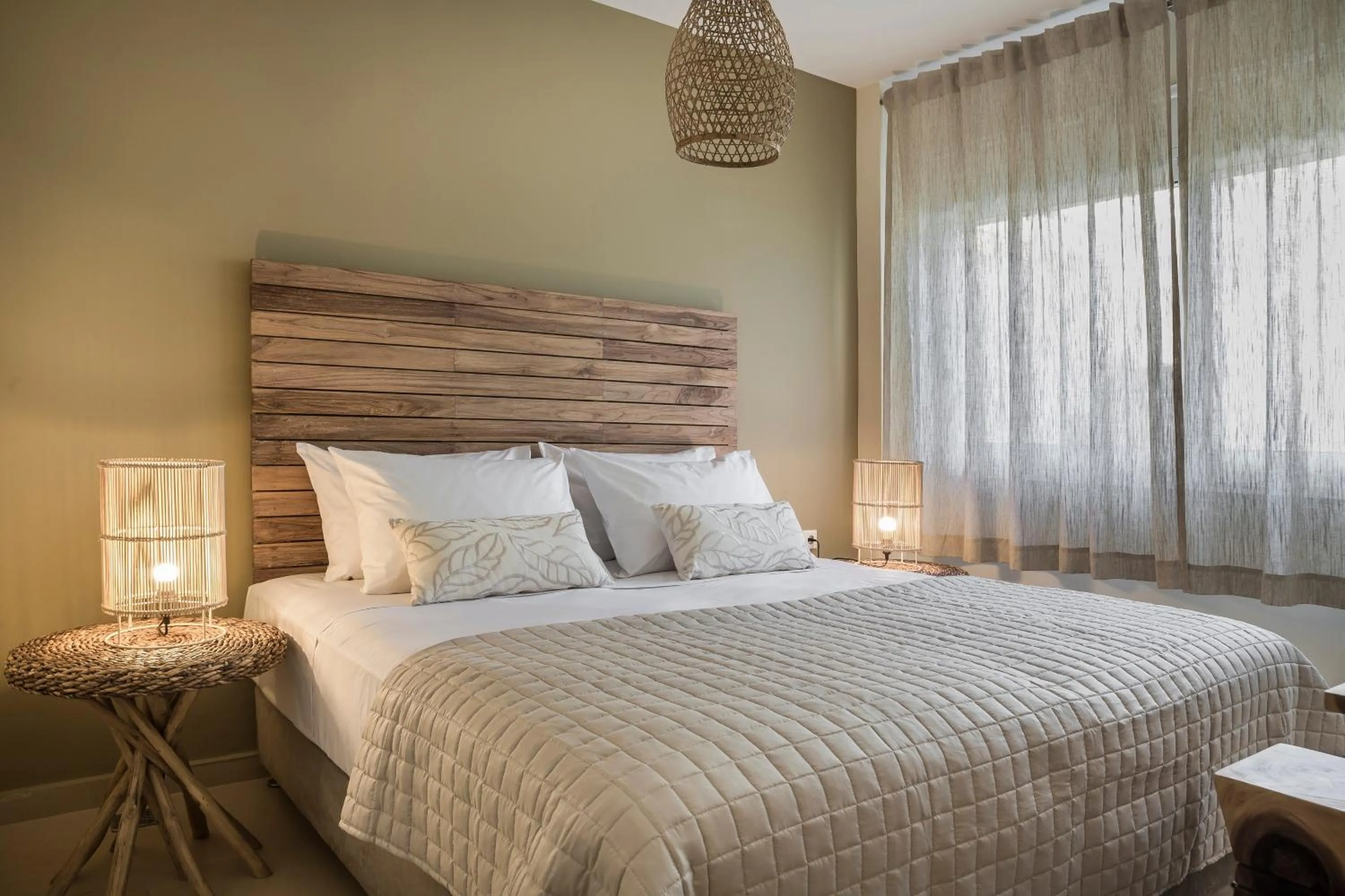 Bed in Meliti Waterfront Suites