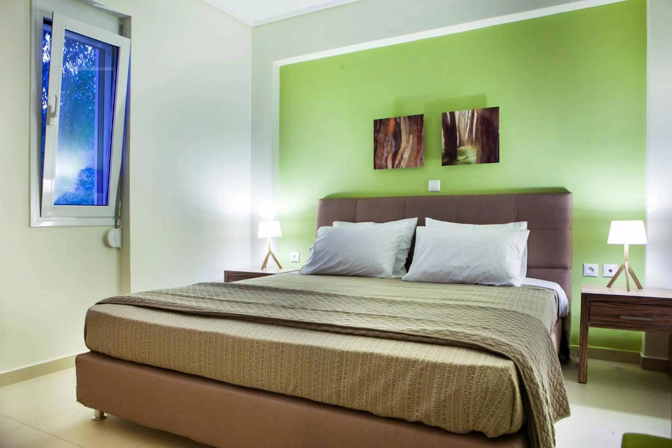 Bed in Meliti Waterfront Suites