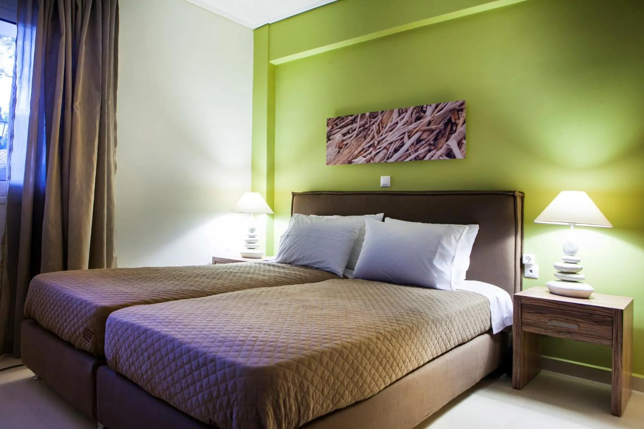 Bed in Meliti Waterfront Suites