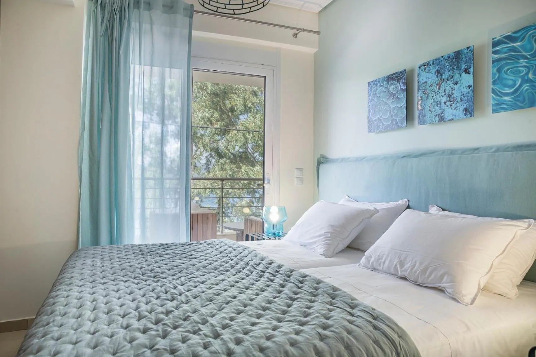 Bed in Meliti Waterfront Suites