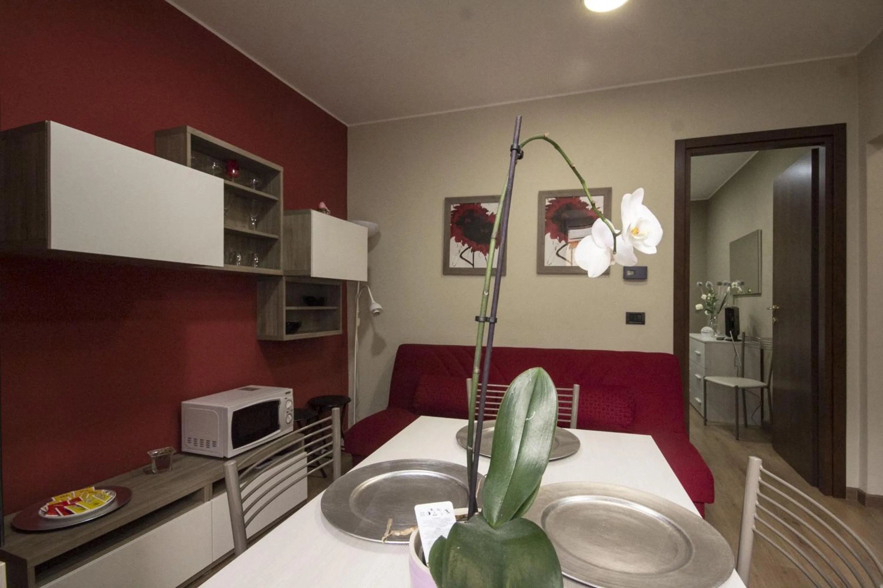 Living room, Bed in Appartamento Il Centro
