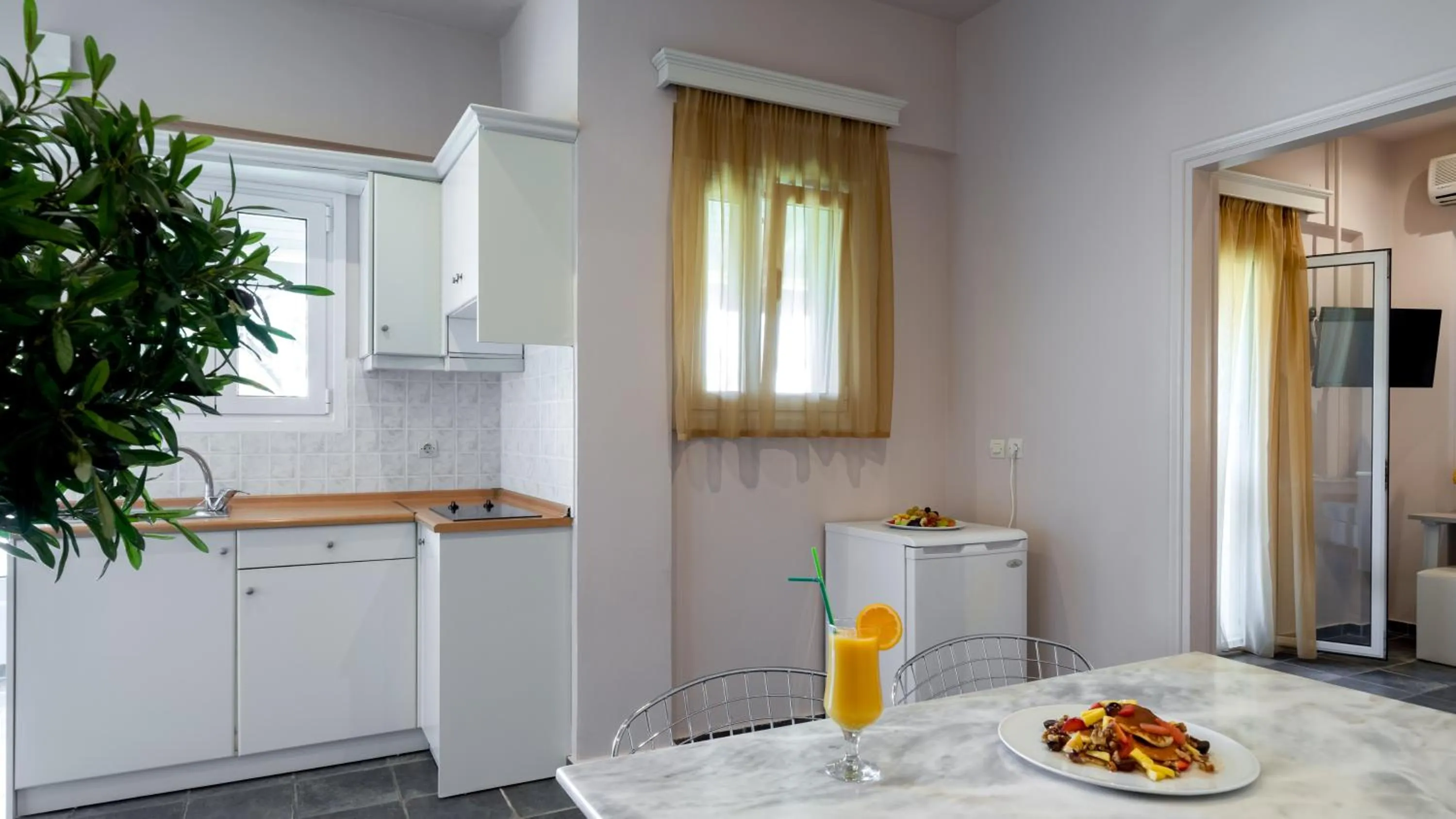 Kitchen or kitchenette in Acharavi Beach Hotel