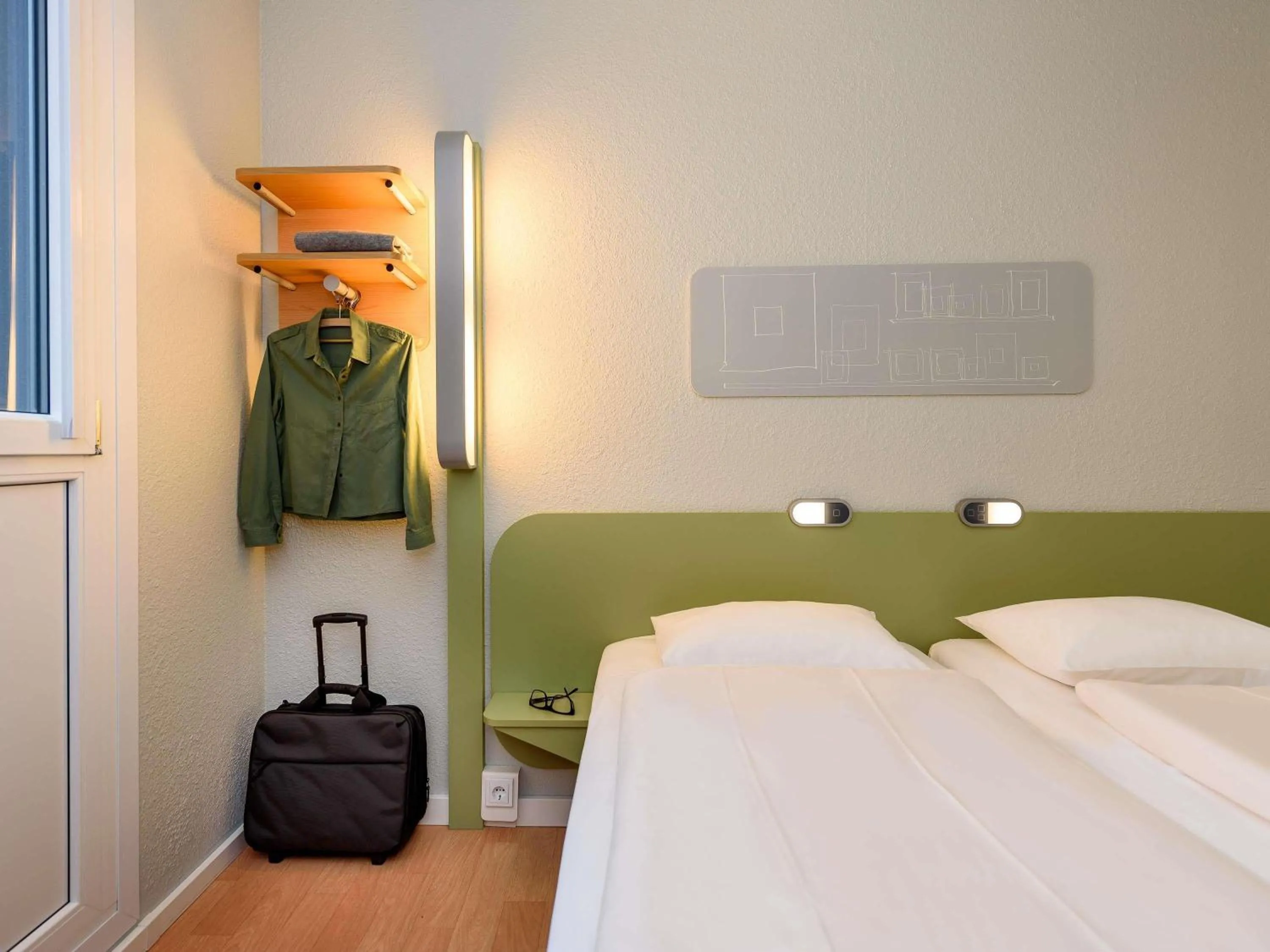 Bedroom in Ibis Budget Leipzig City