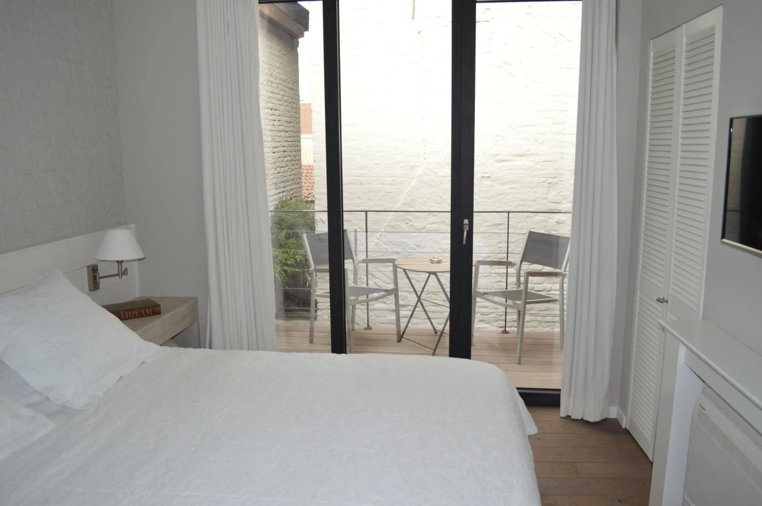 Bed in De Waterzooi Lodge