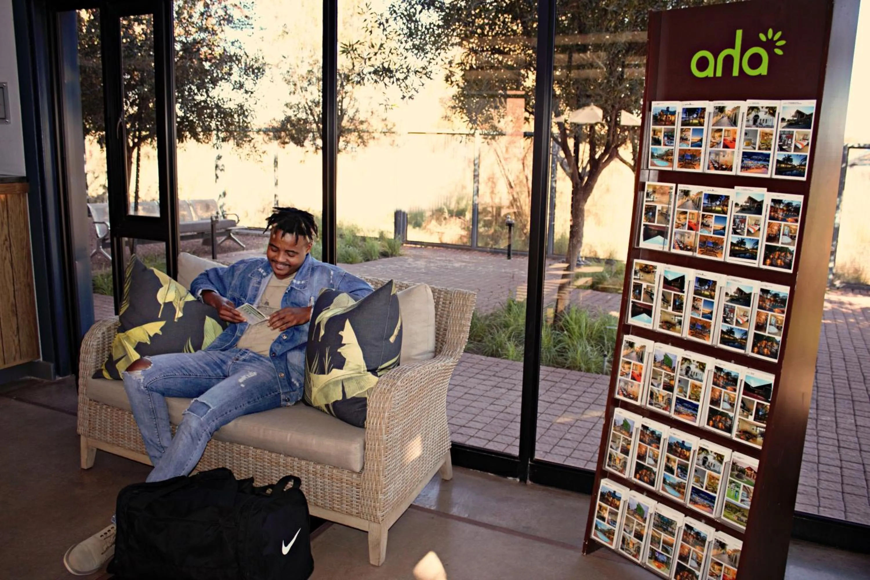 Communal lounge/ TV room in aha Kathu Hotel