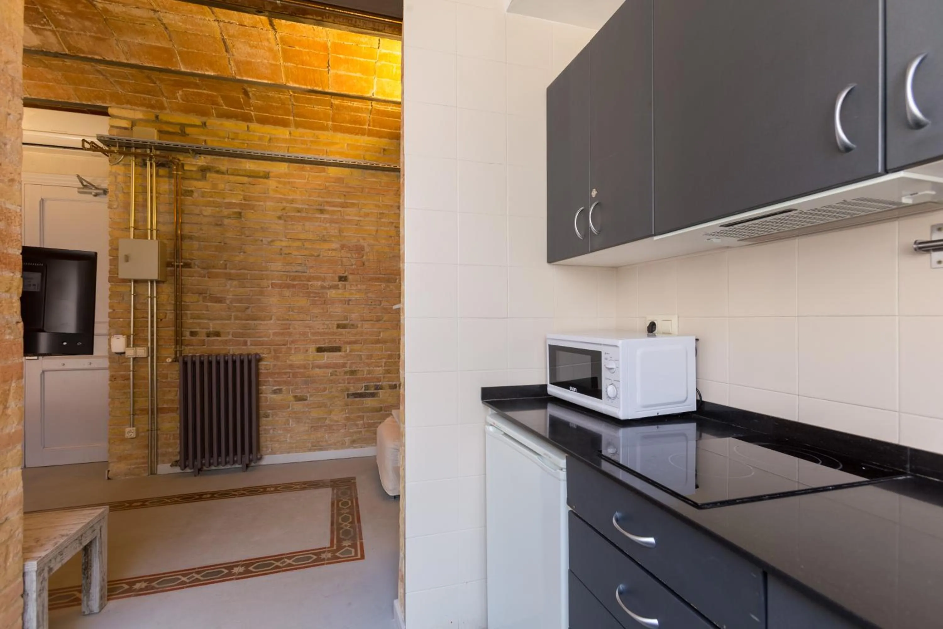 Kitchen or kitchenette in Apartamentos DV