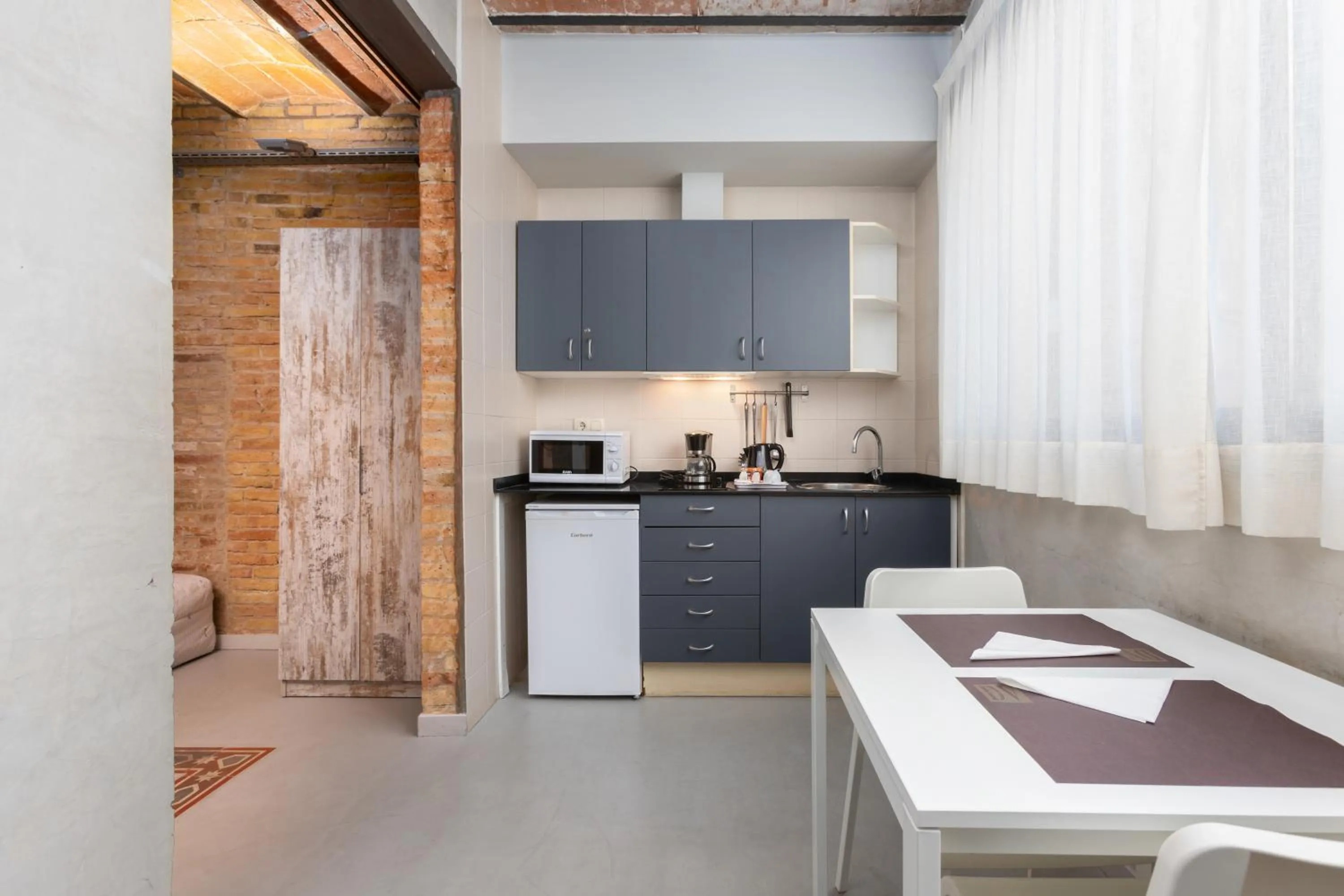 Kitchen or kitchenette in Apartamentos DV