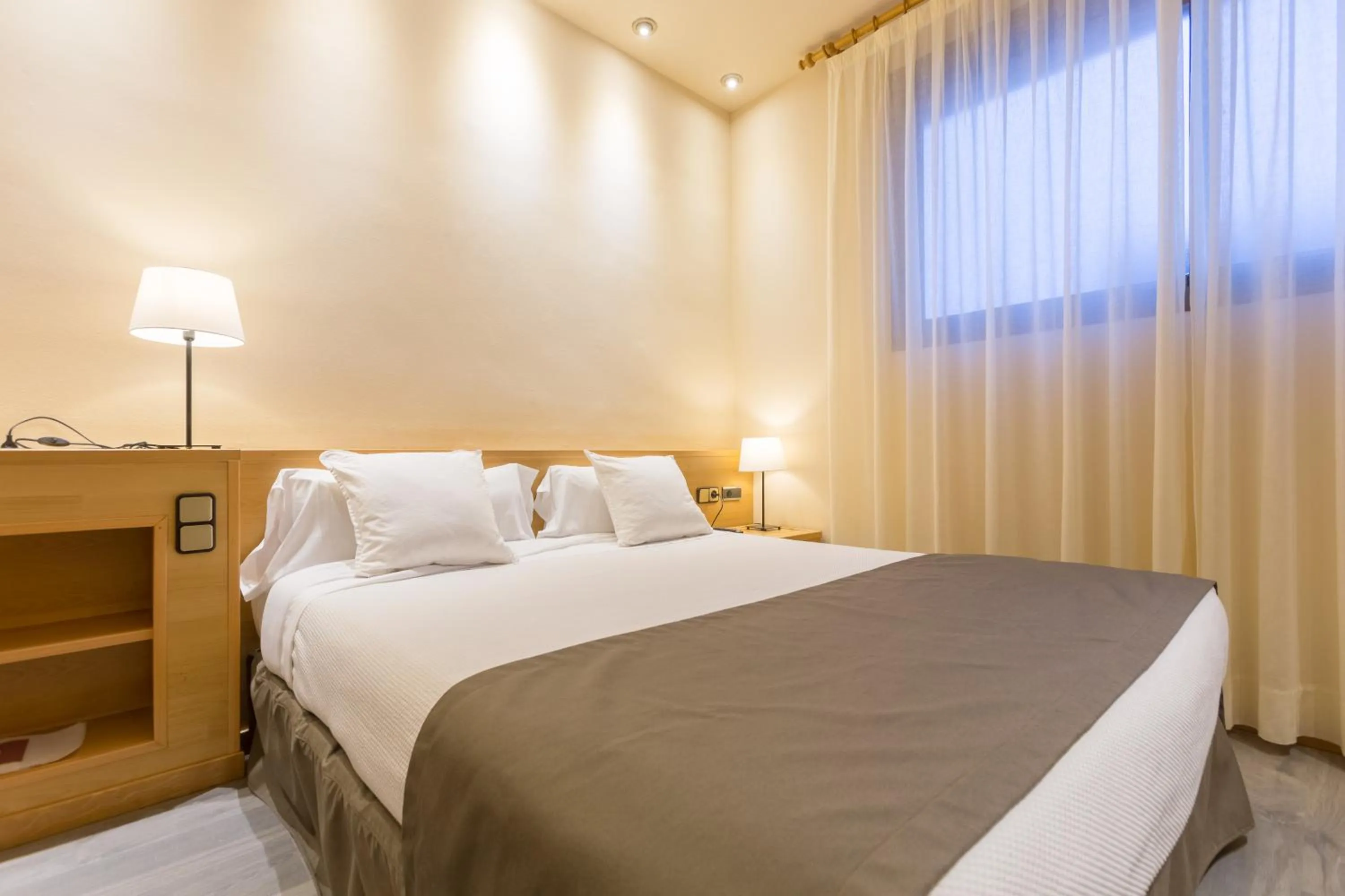 Bed in Apartamentos DV