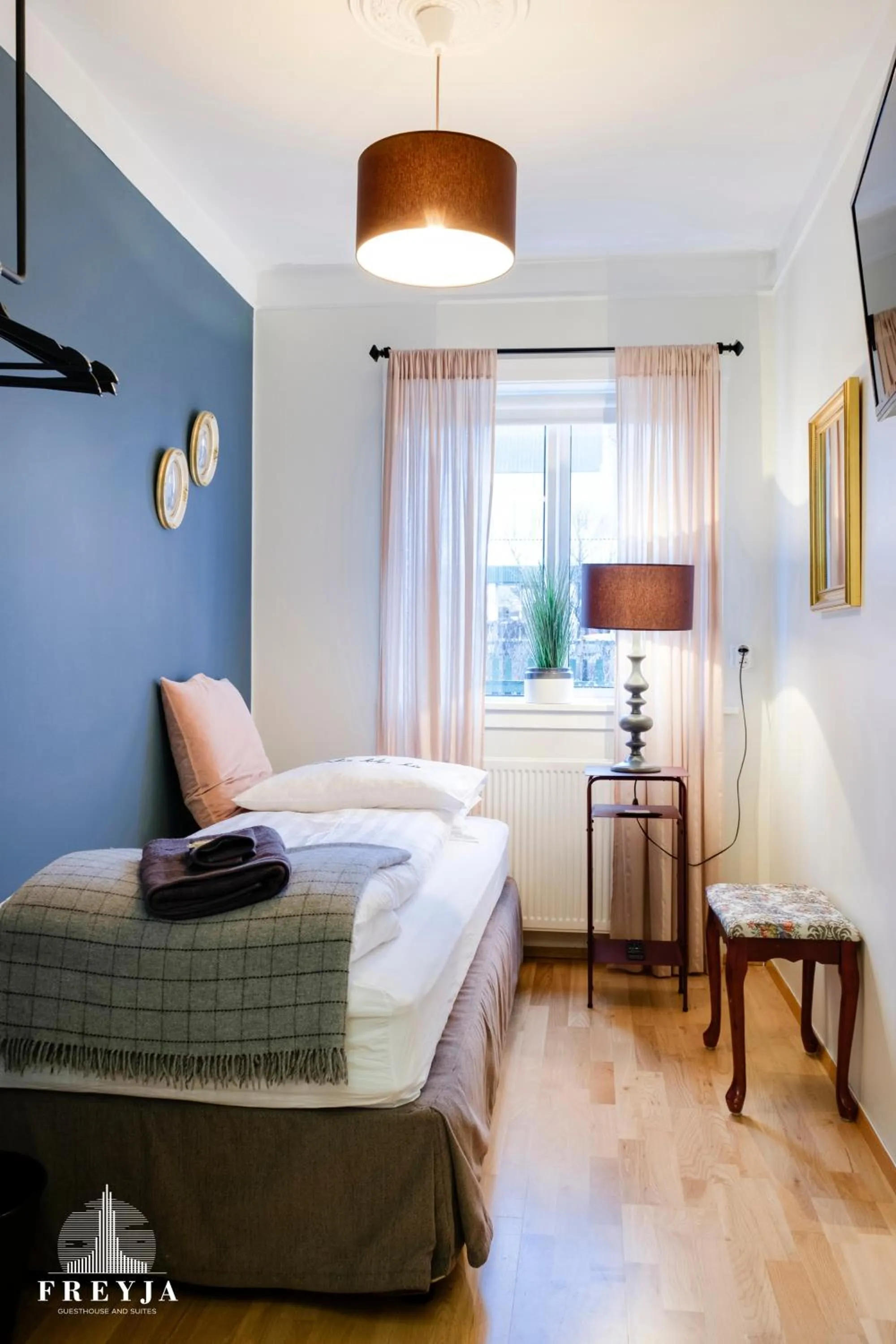 Bed in Freyja Guesthouse & Suites