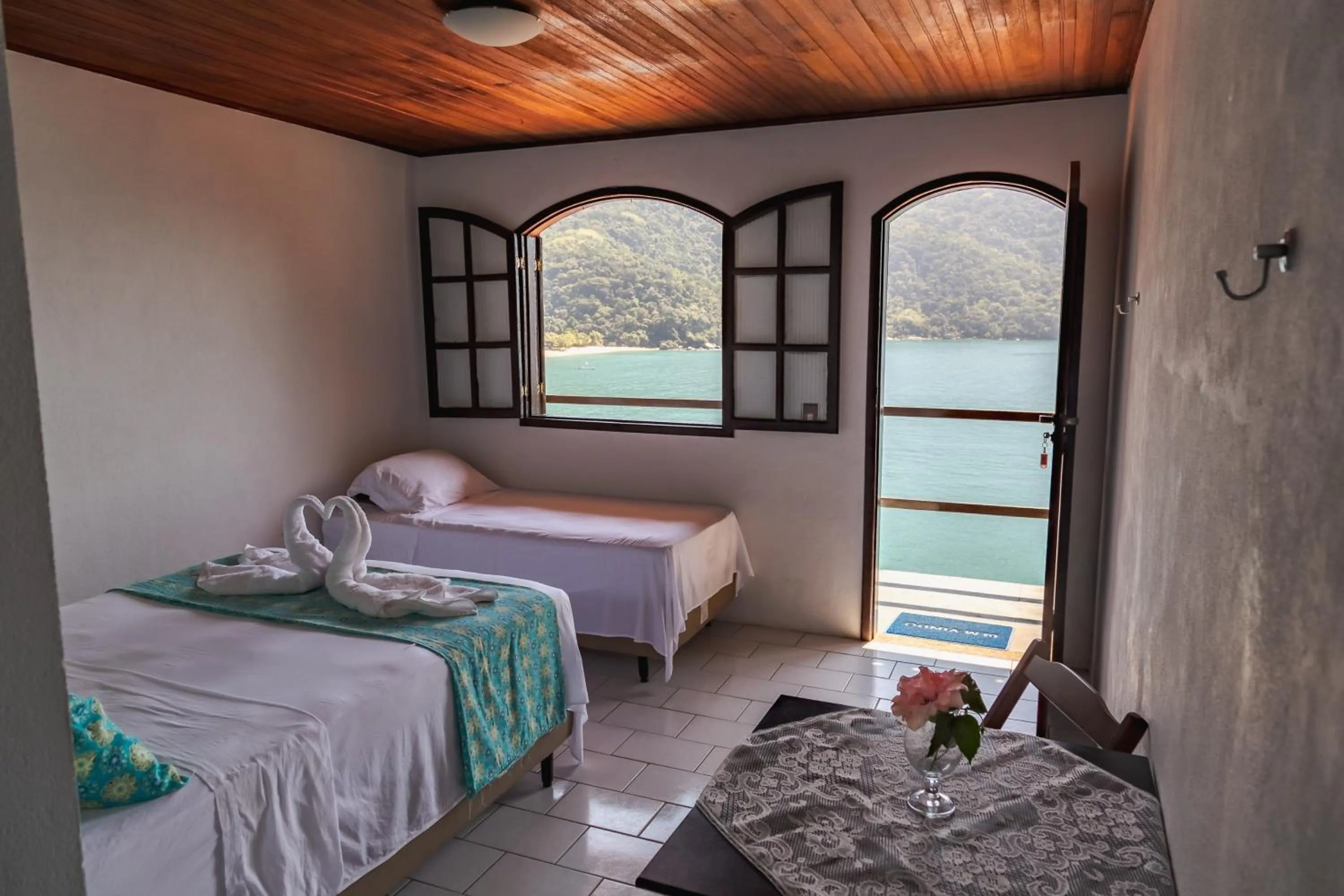 Bed in Pousada Toca do Mar