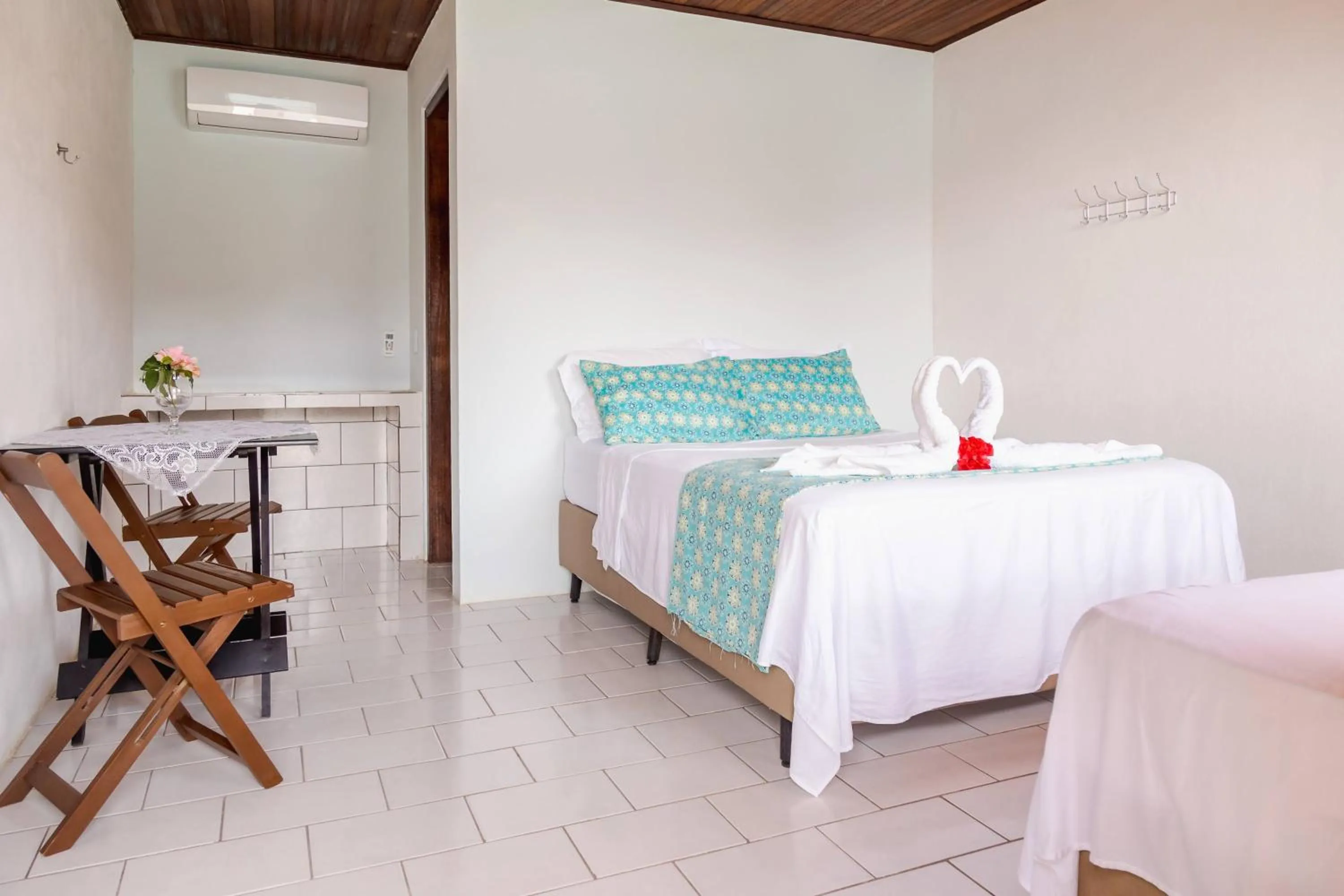 Bed in Pousada Toca do Mar