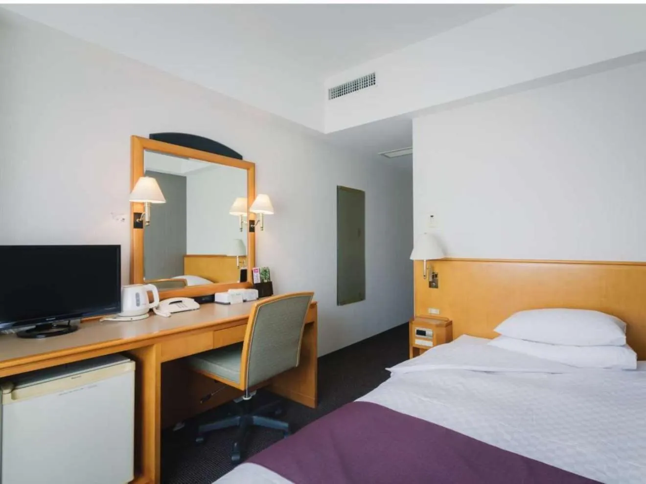 Photo of the whole room, Bed in JR Hotel Clement Uwajima