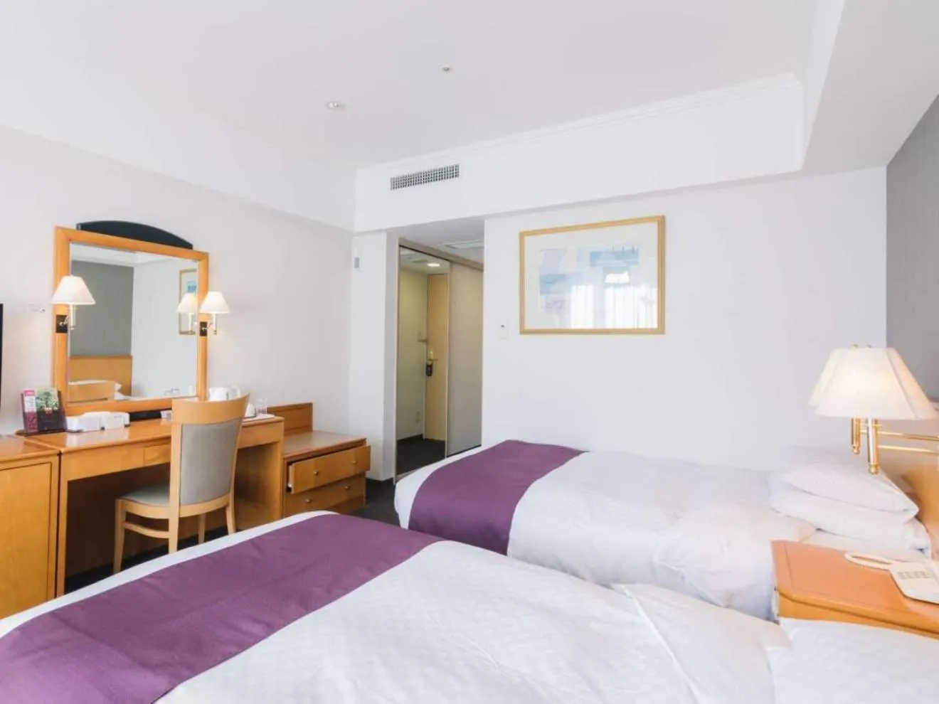 Photo of the whole room, Bed in JR Hotel Clement Uwajima