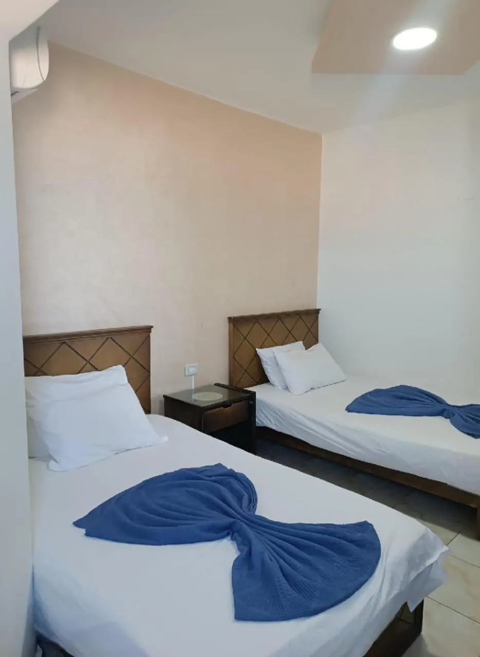 Bedroom, Bed in Ras El Bar Apartments Armed Forces