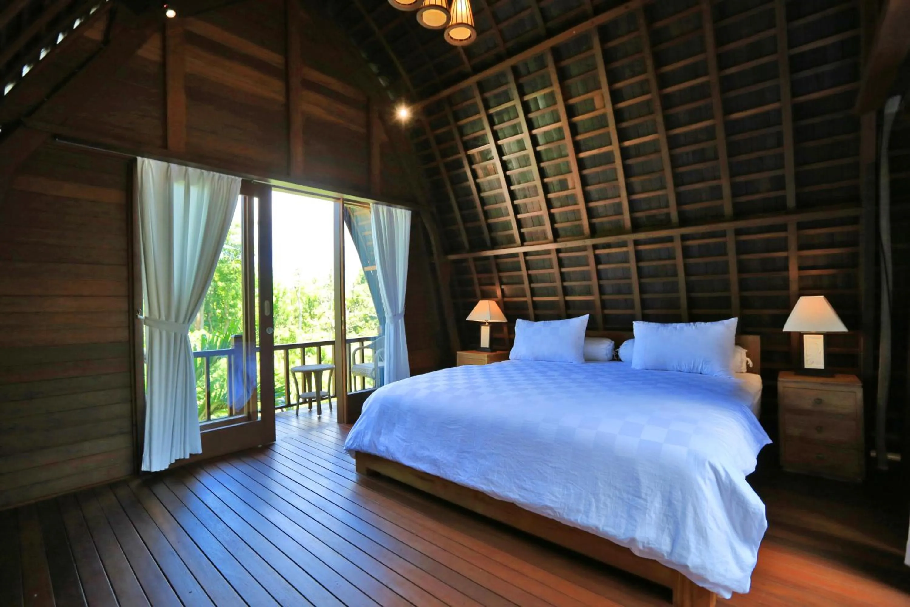 Bed in Raja Woods Villa