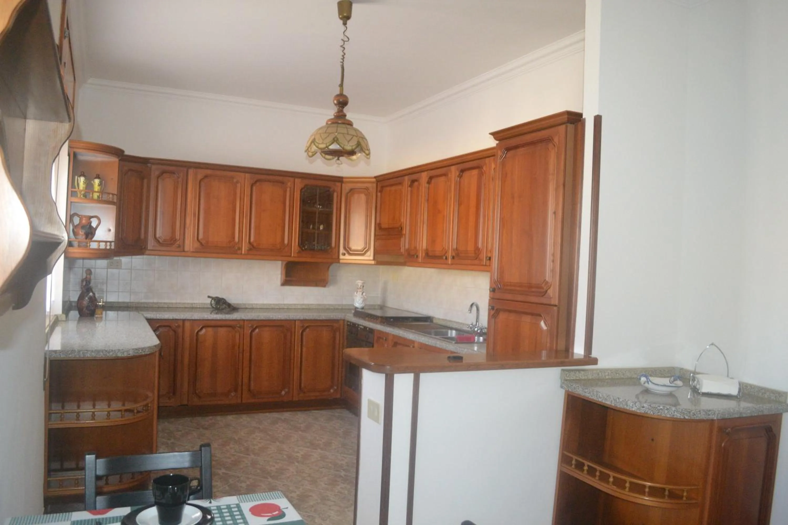 Communal kitchen in B&B Casa degli Ulivi