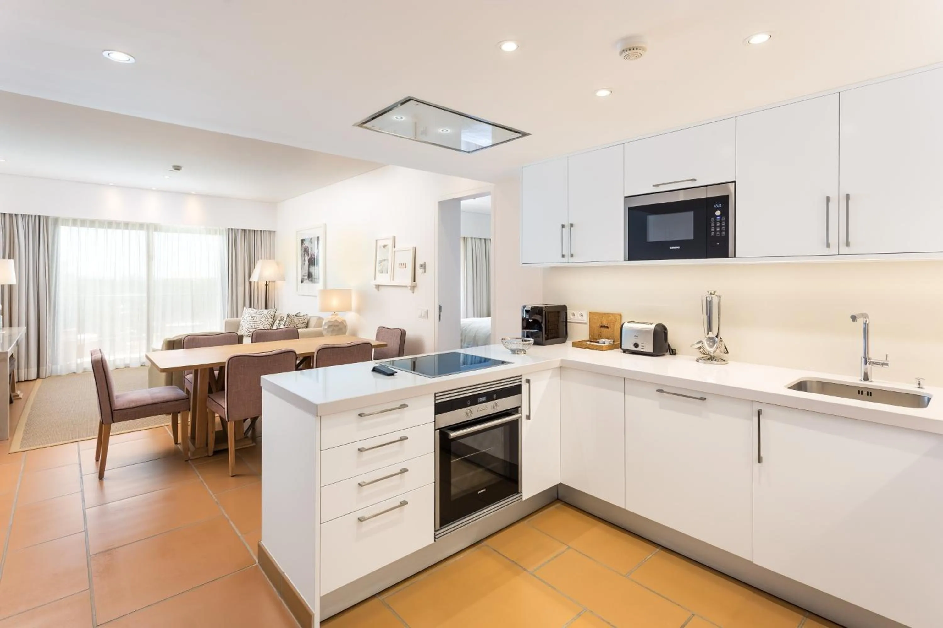 Kitchen or kitchenette in Pine Cliffs Ocean Suites, a Luxury Collection Resort & Spa, Algarve