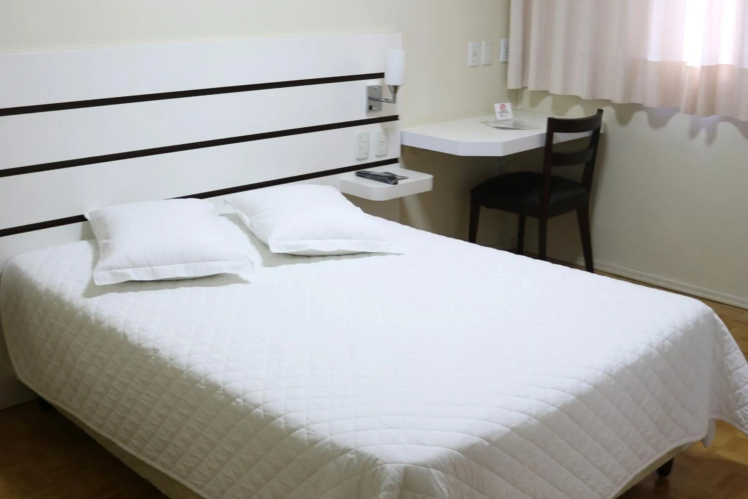 Bed in Tri Hotel Xanxerê