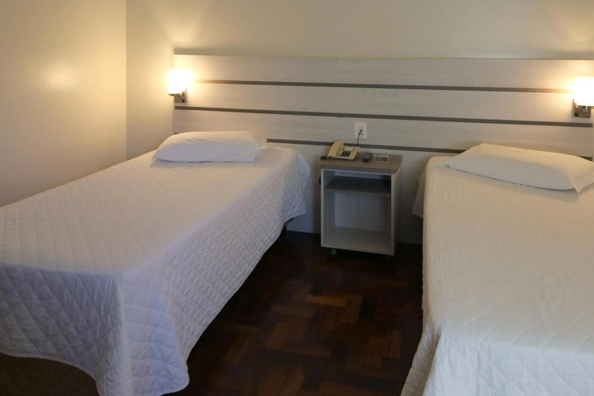 Bed in Tri Hotel Xanxerê