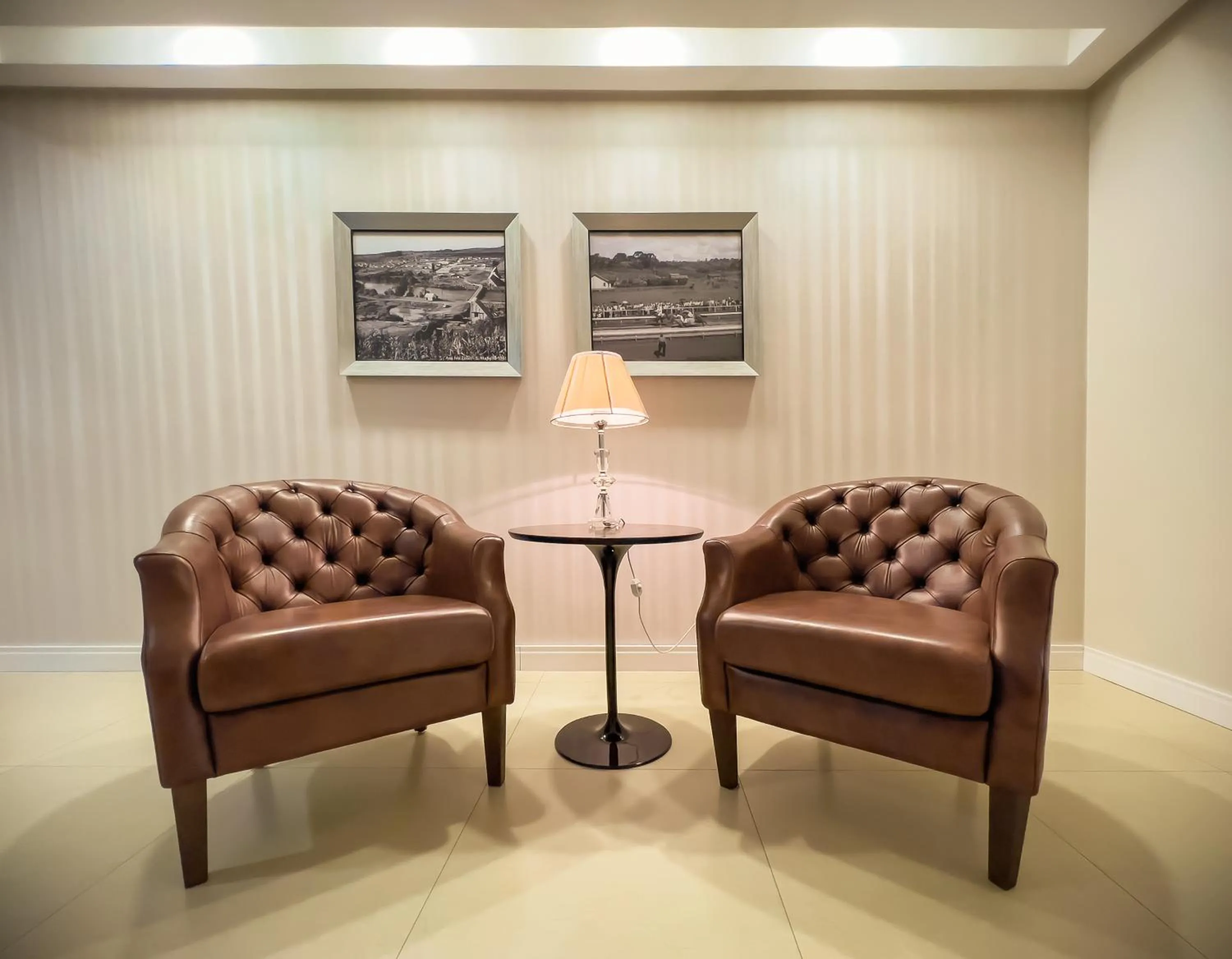 Seating area in Tri Hotel Xanxerê