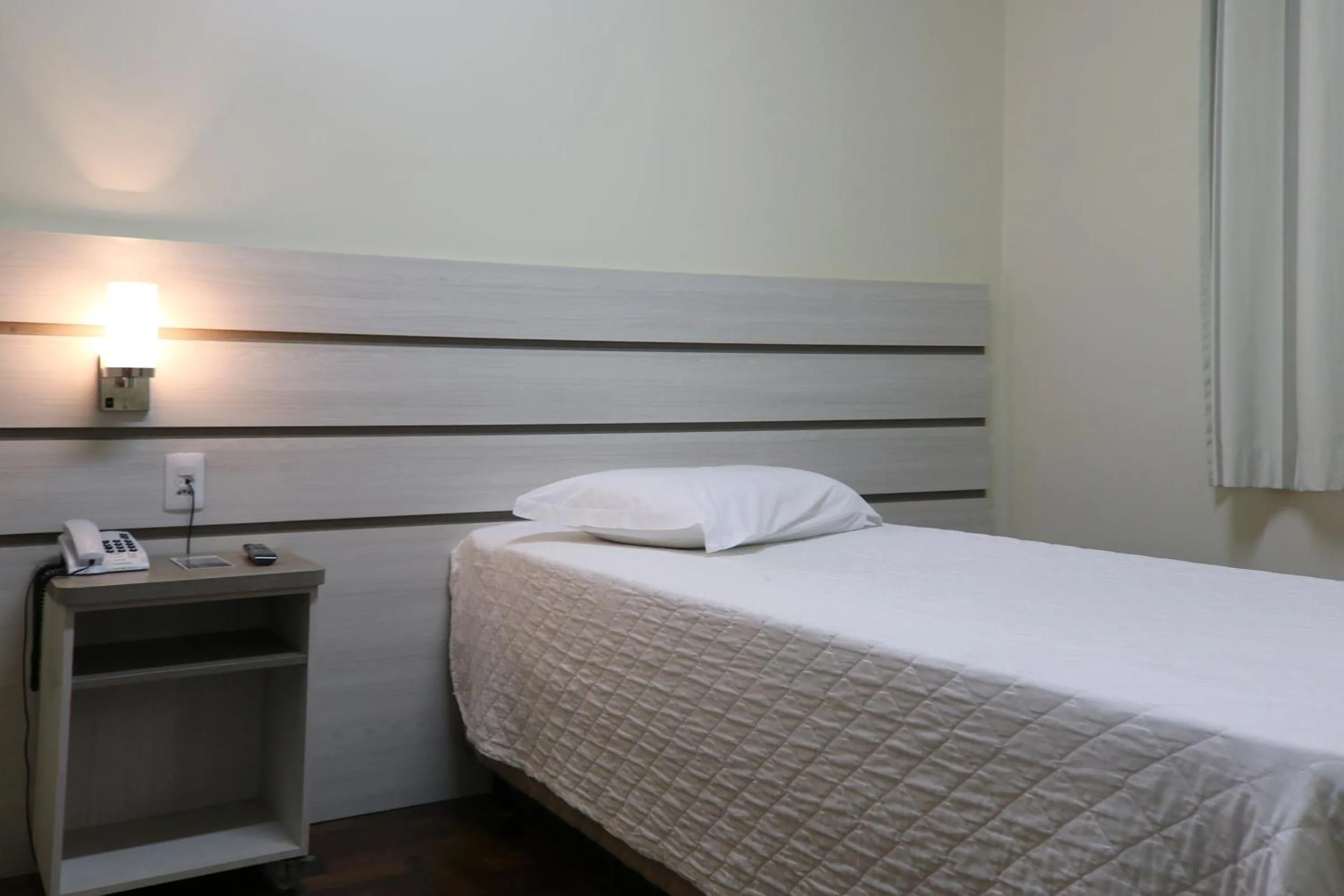 Bed in Tri Hotel Xanxerê