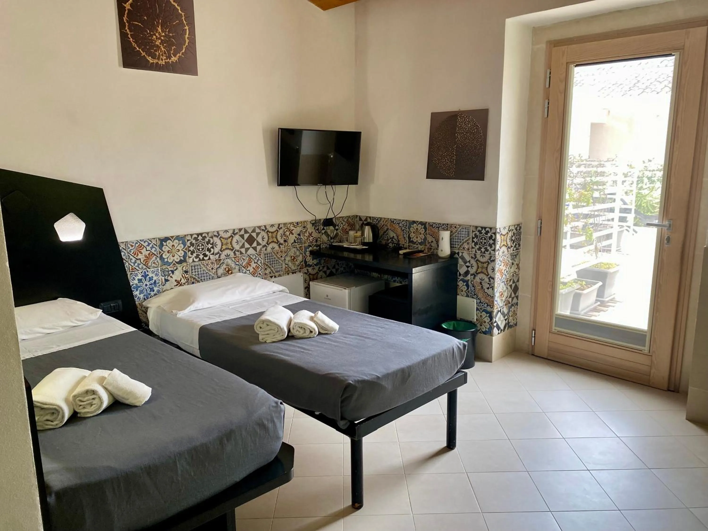 Photo of the whole room, Bed in Addauro Resort