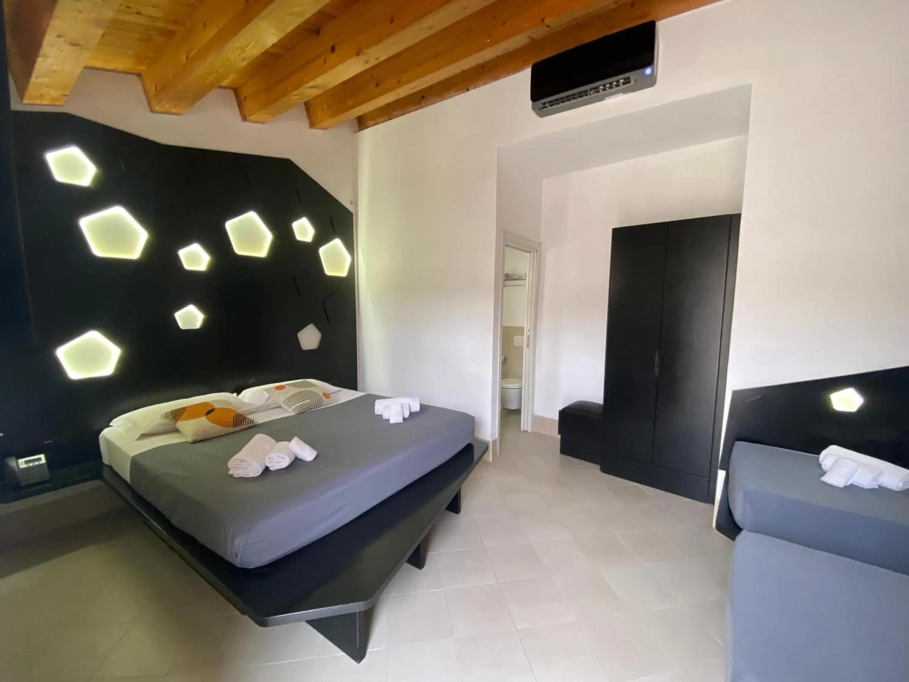 Photo of the whole room, Bed in Addauro Resort