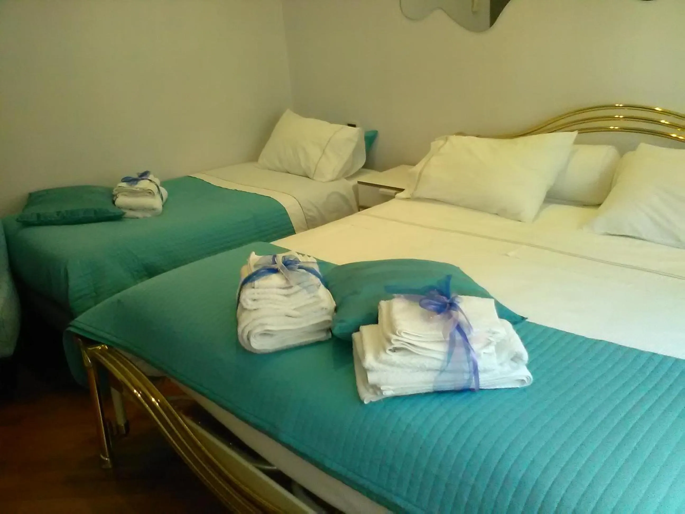 Photo of the whole room, Bed in Dimora Tafuri