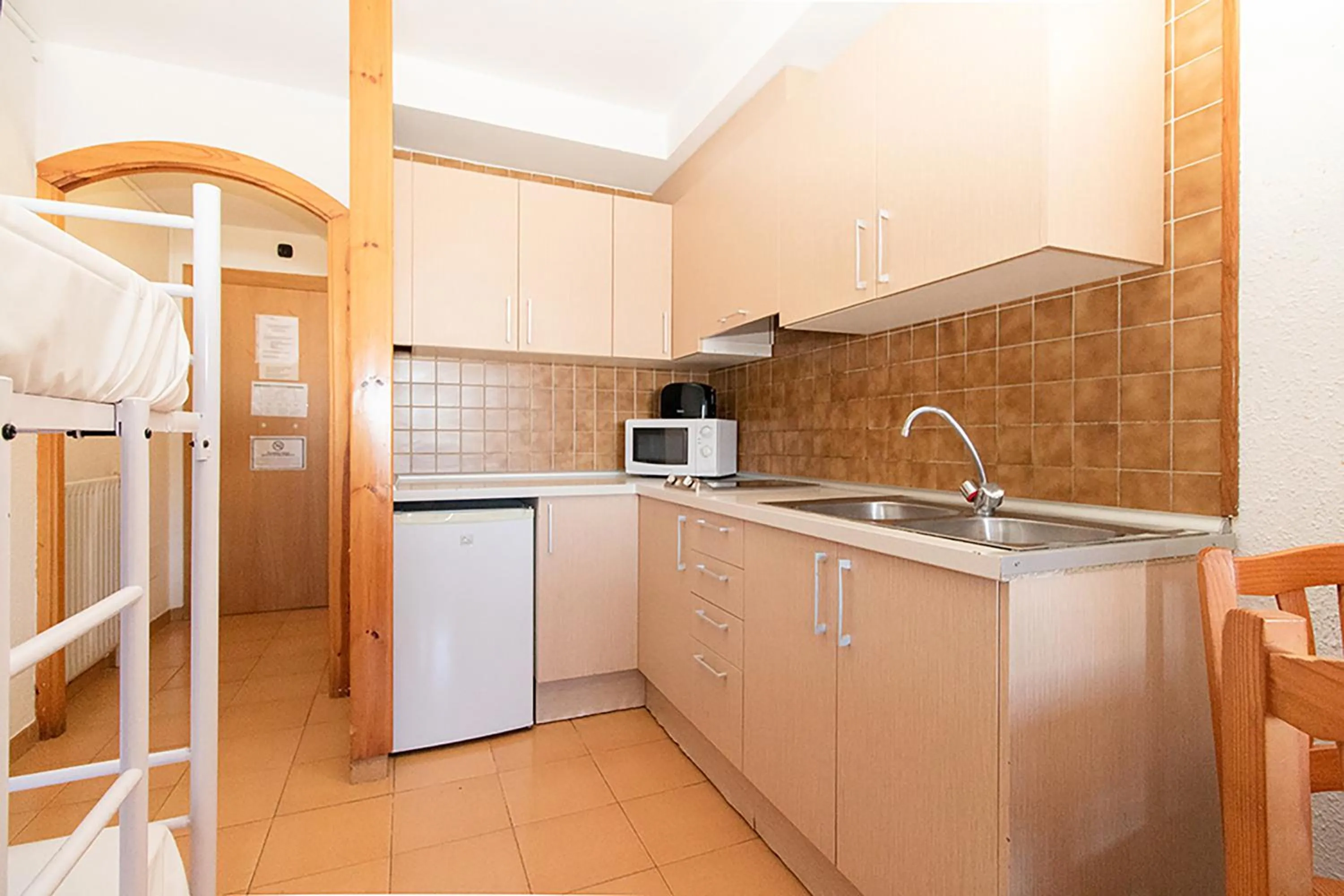Kitchen or kitchenette in Estudis Turístics Cims Pas 3000