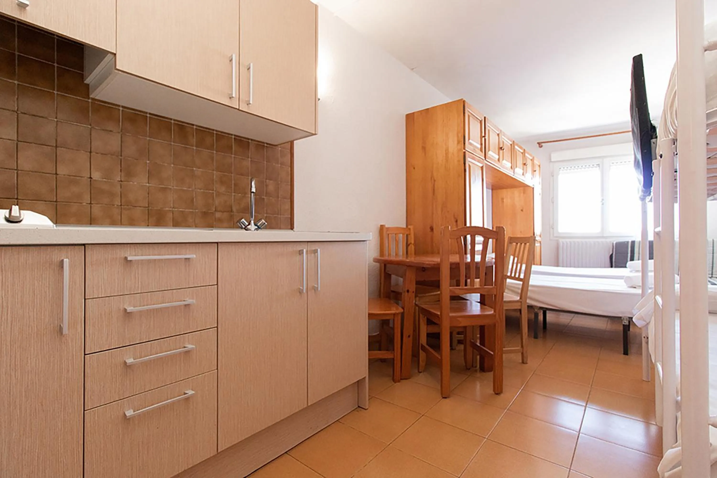 Kitchen or kitchenette in Estudis Turístics Cims Pas 3000