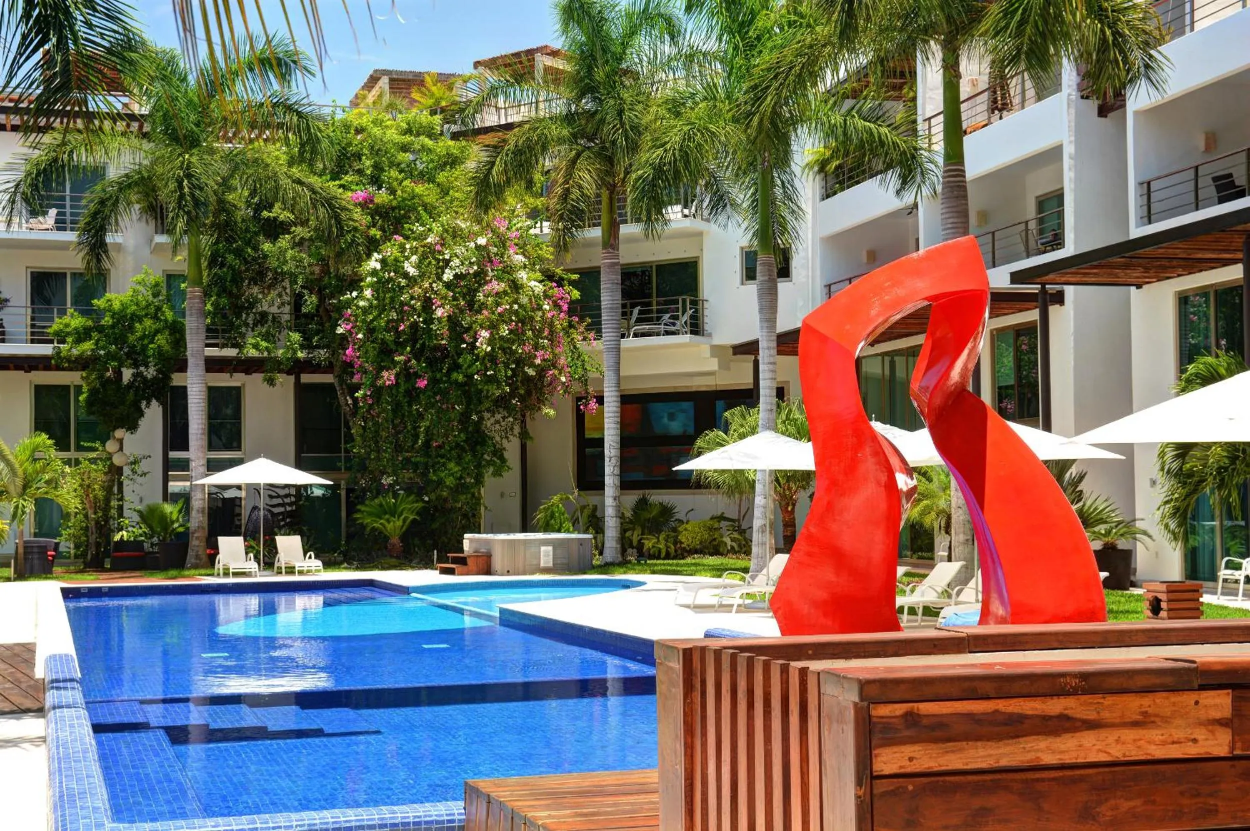 Property building in Luxurious & Central Condo In Playa Steps From The Beach