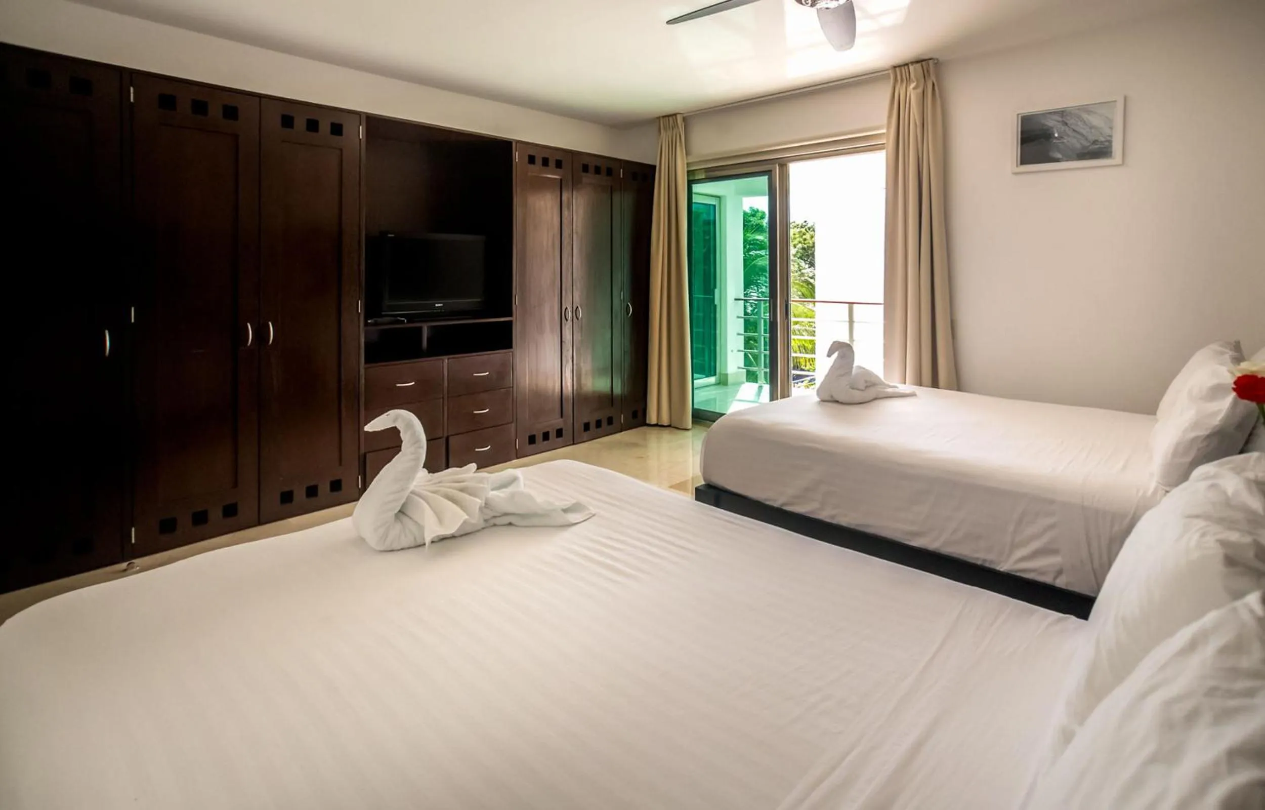 Balcony/Terrace, Bed in Luxurious & Central Condo In Playa Steps From The Beach