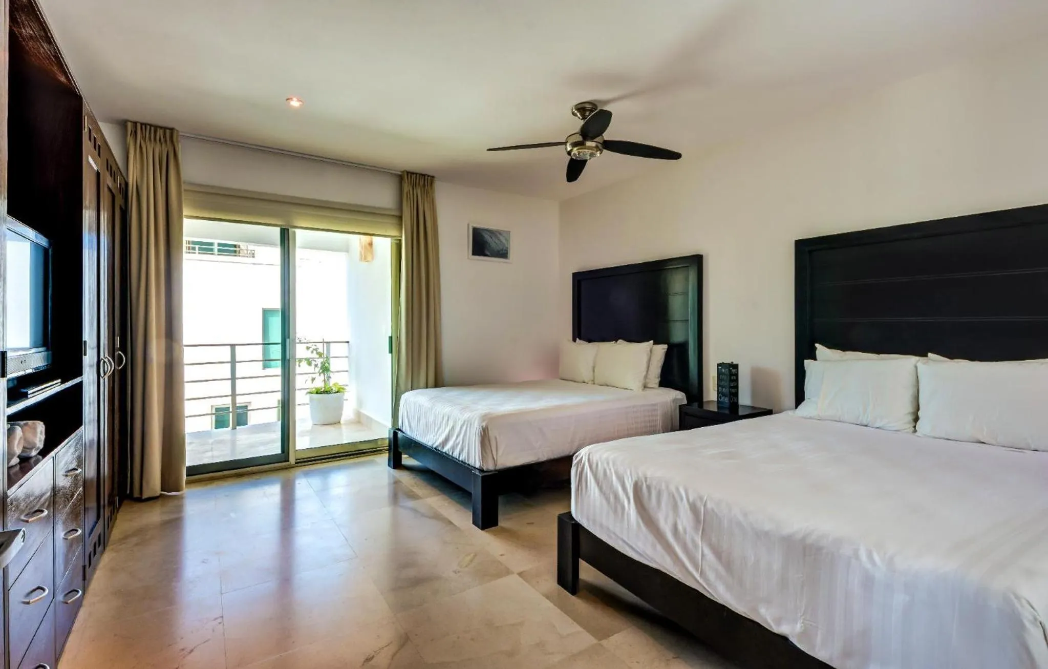Bed in Luxurious & Central Condo In Playa Steps From The Beach