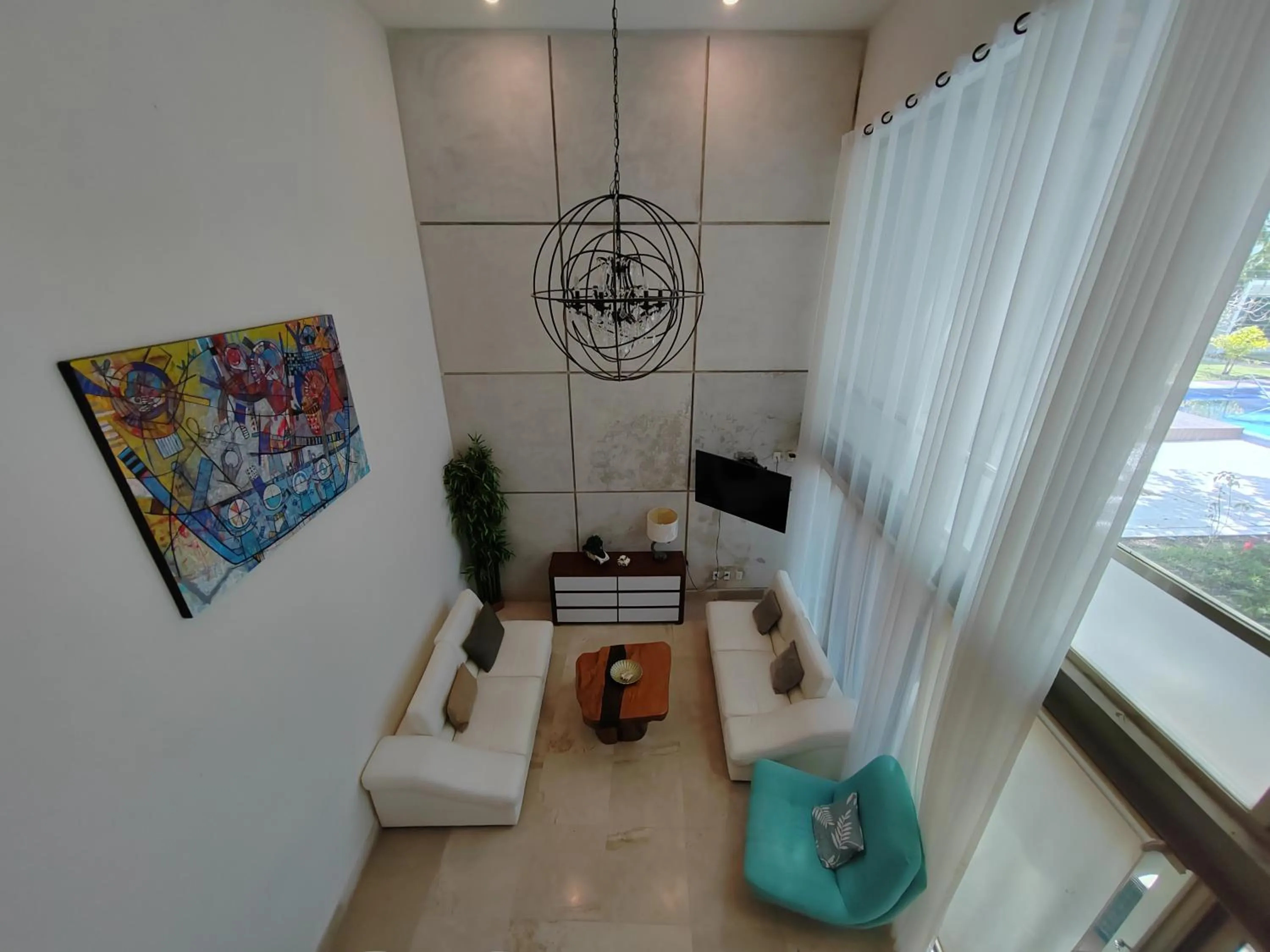Living room in Luxurious & Central Condo In Playa Steps From The Beach