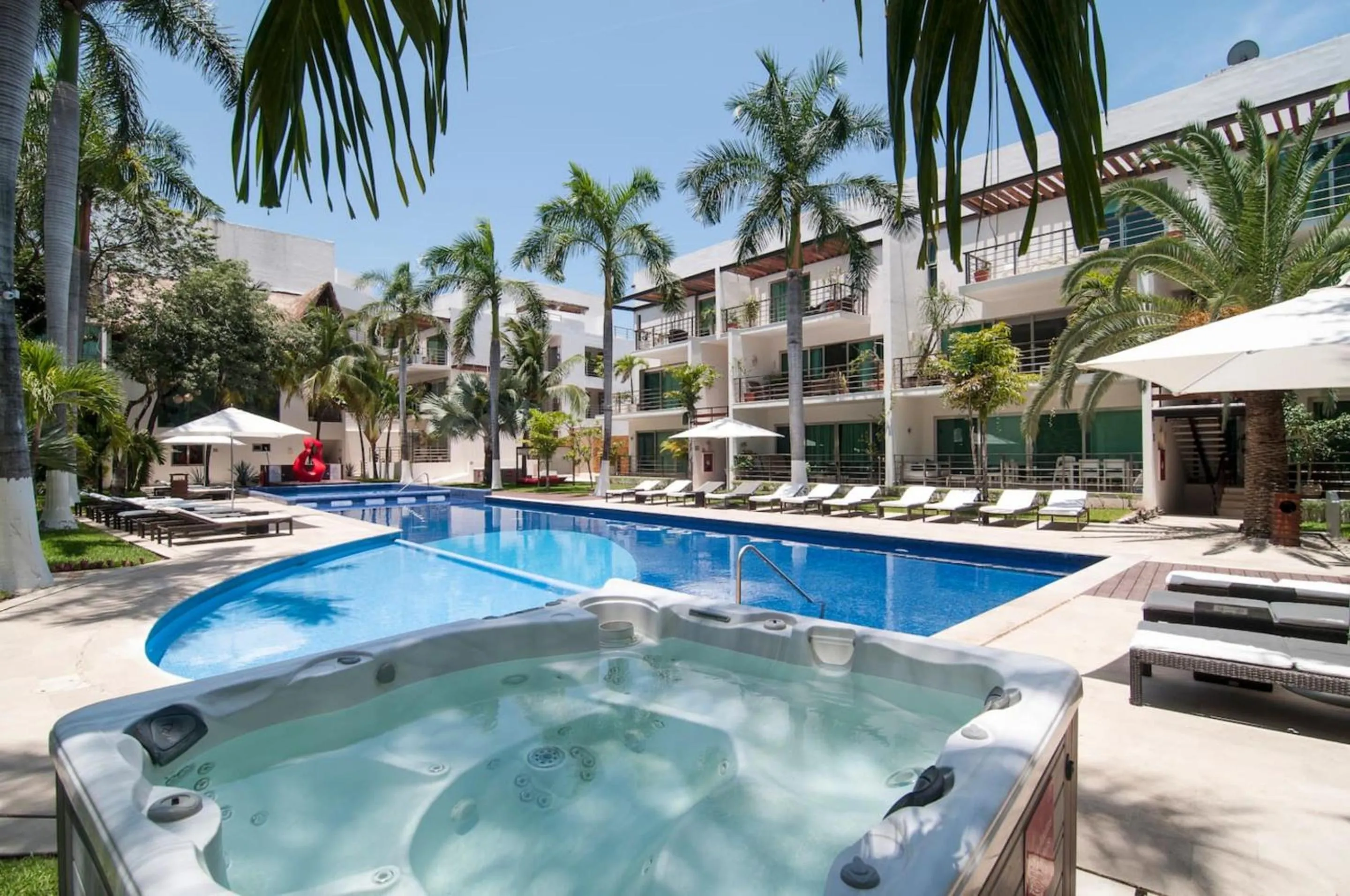 Pool view in Luxurious & Central Condo In Playa Steps From The Beach