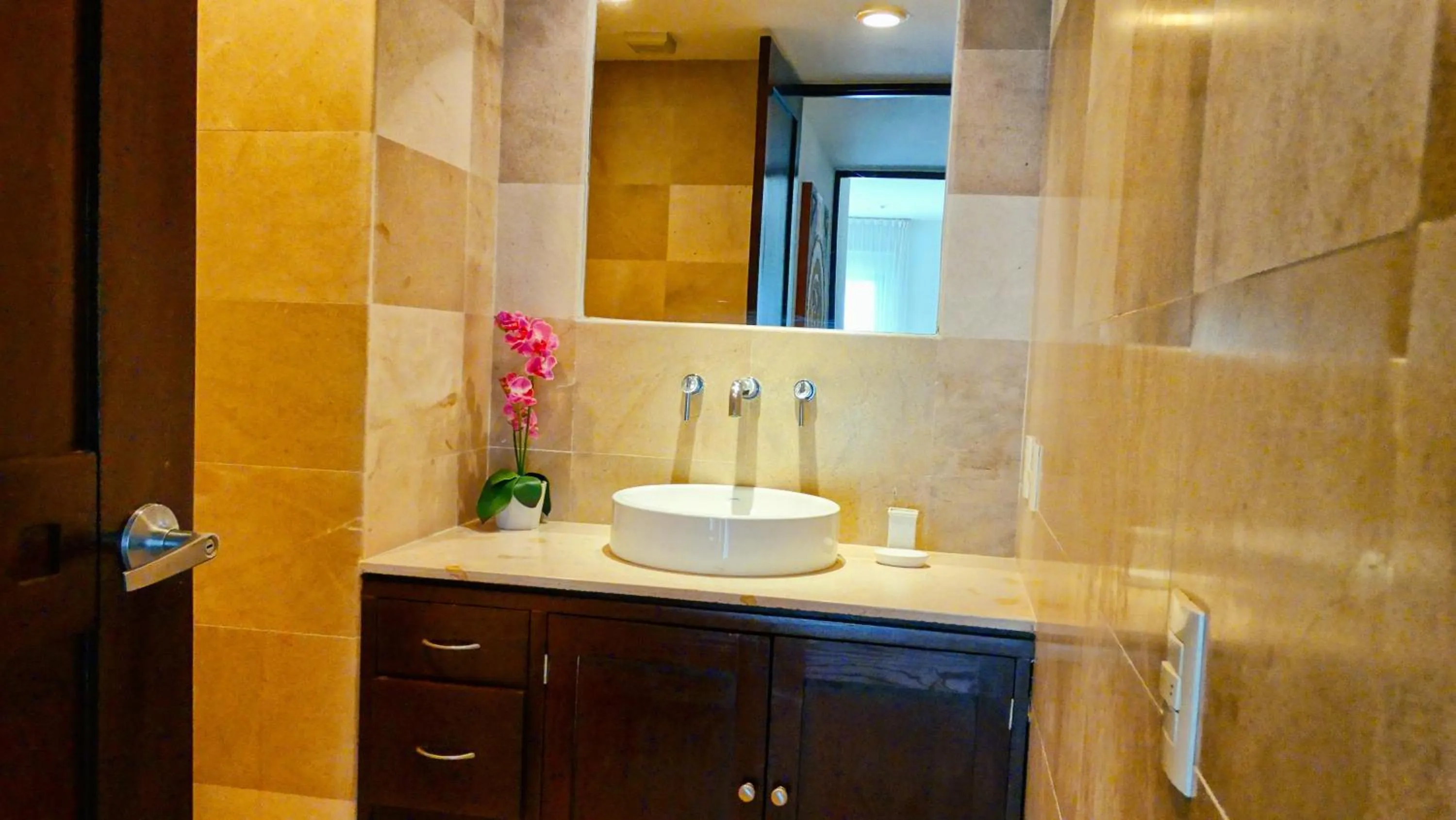 Bathroom in Luxurious & Central Condo In Playa Steps From The Beach