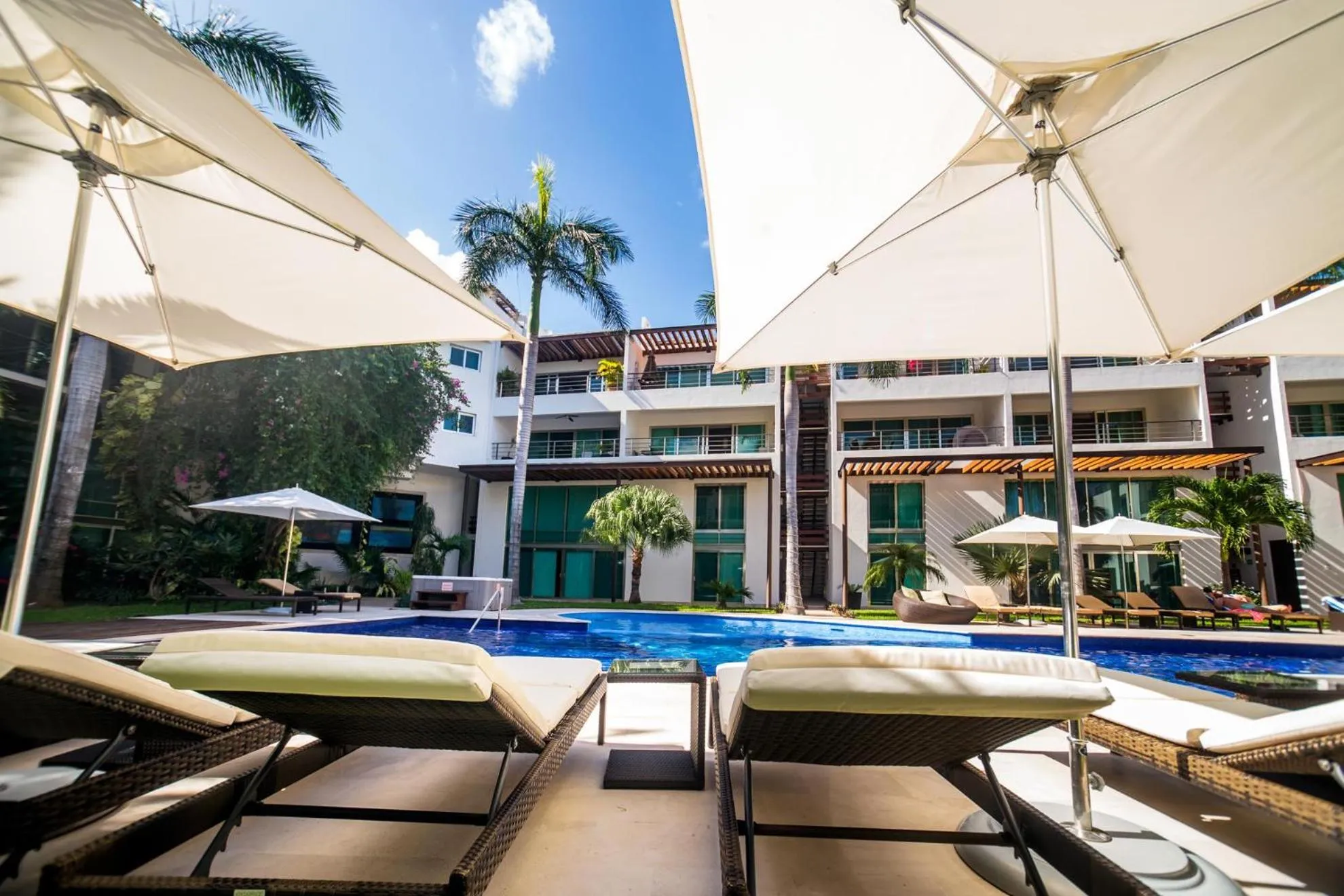 Property building in Luxurious & Central Condo In Playa Steps From The Beach