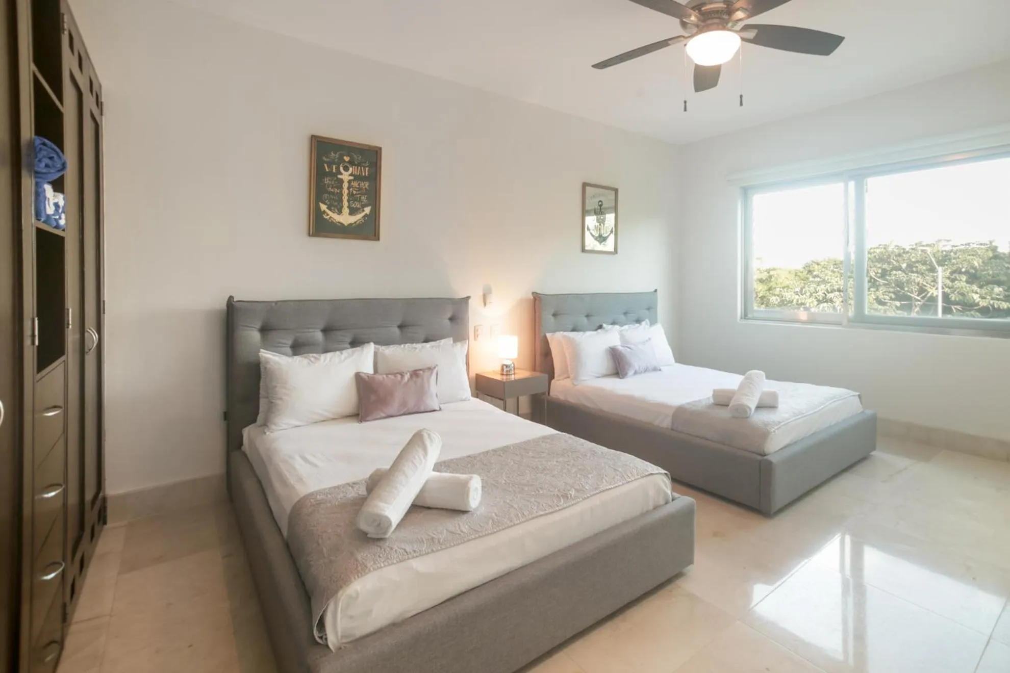 Bed in Luxurious & Central Condo In Playa Steps From The Beach