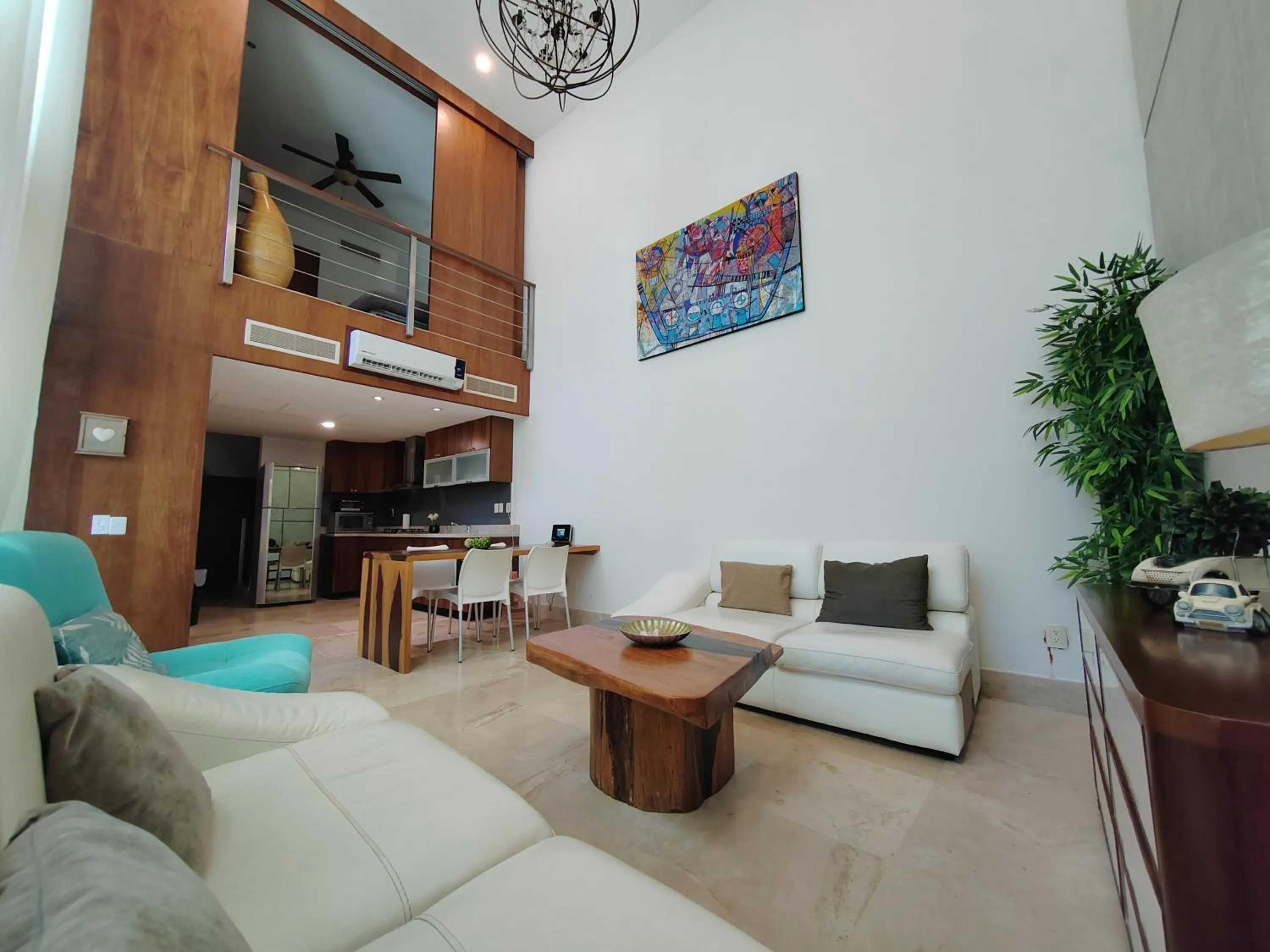 Communal lounge/ TV room in Luxurious & Central Condo In Playa Steps From The Beach