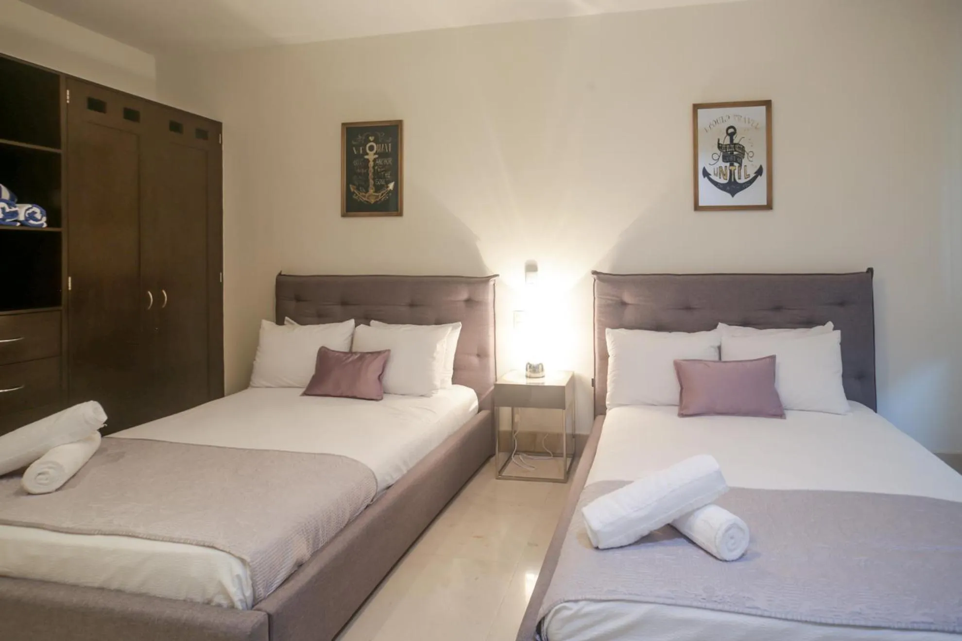 Bed in Luxurious & Central Condo In Playa Steps From The Beach