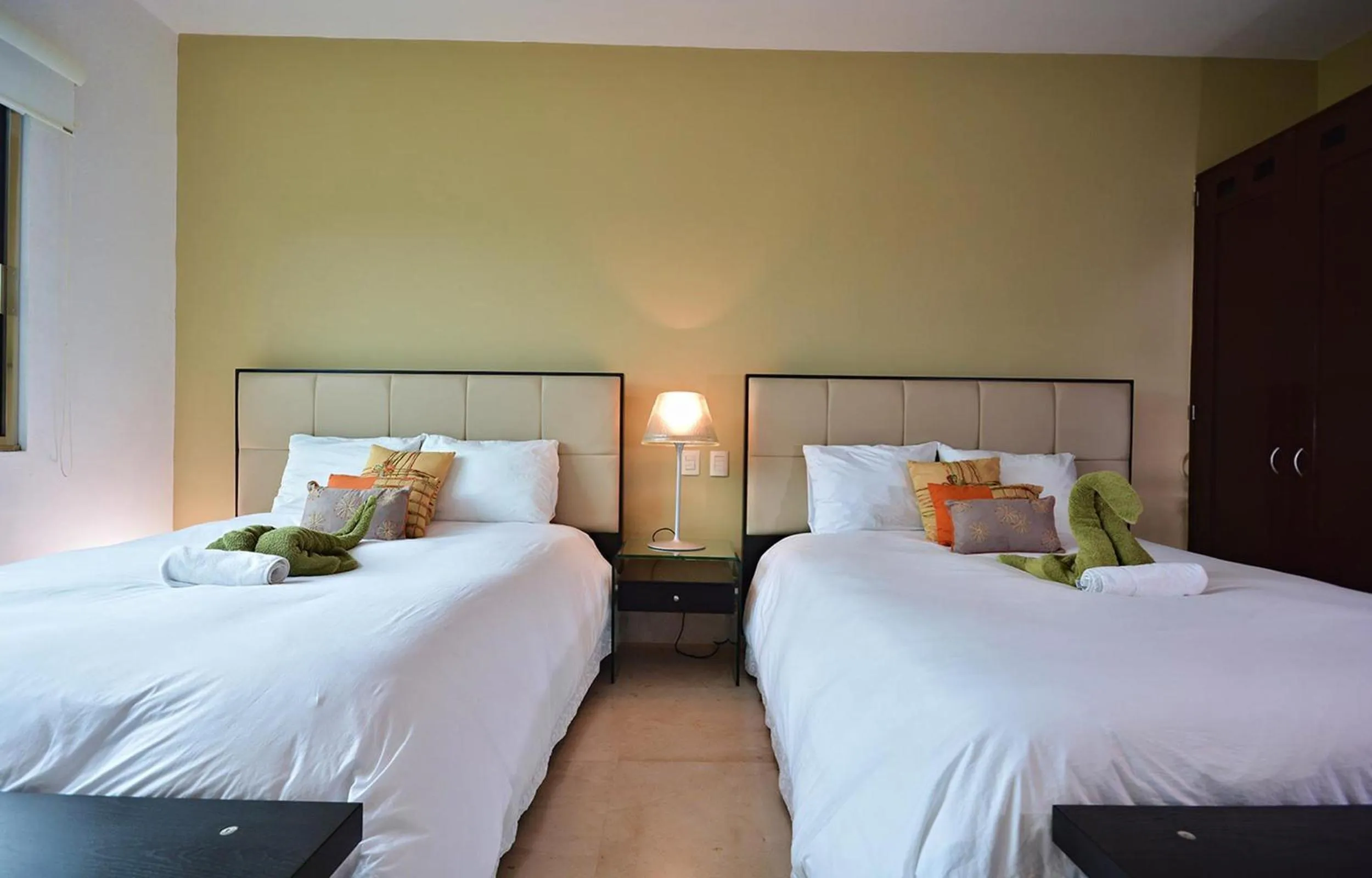 Bedroom, Bed in Luxurious & Central Condo In Playa Steps From The Beach