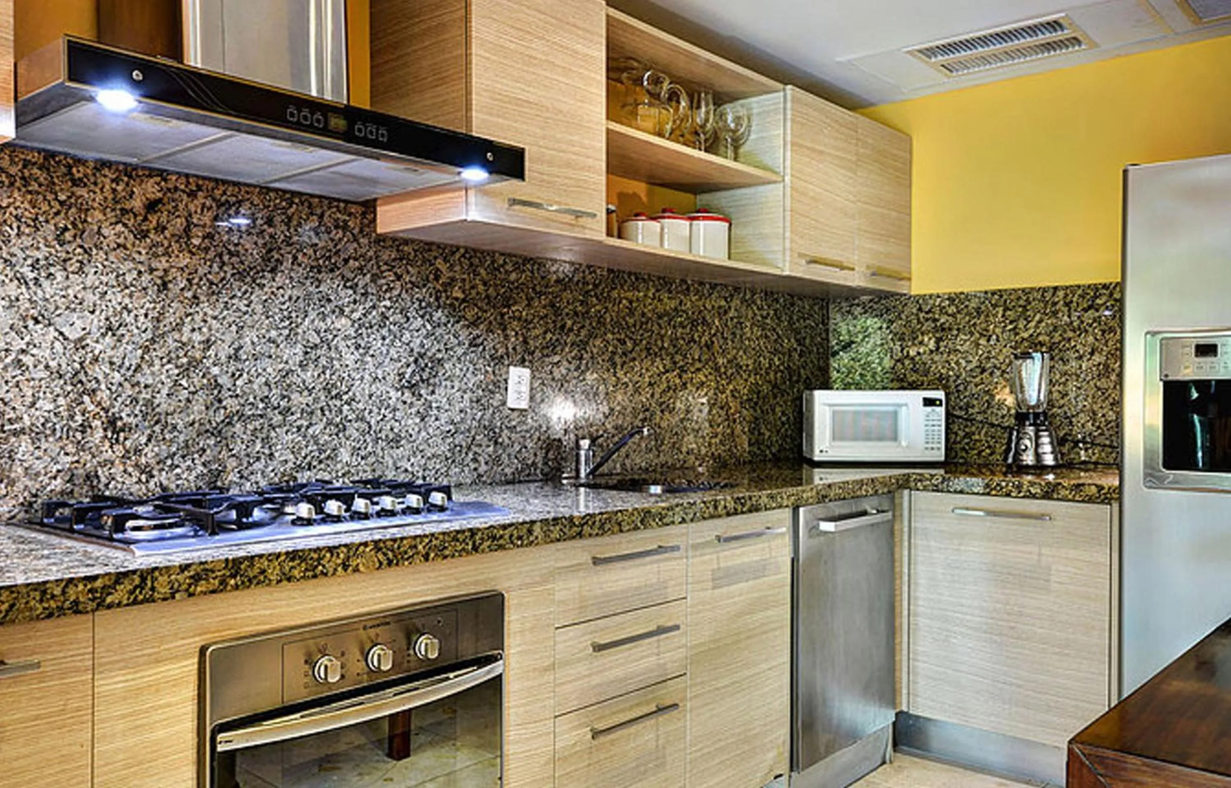 Kitchen or kitchenette in Luxurious & Central Condo In Playa Steps From The Beach